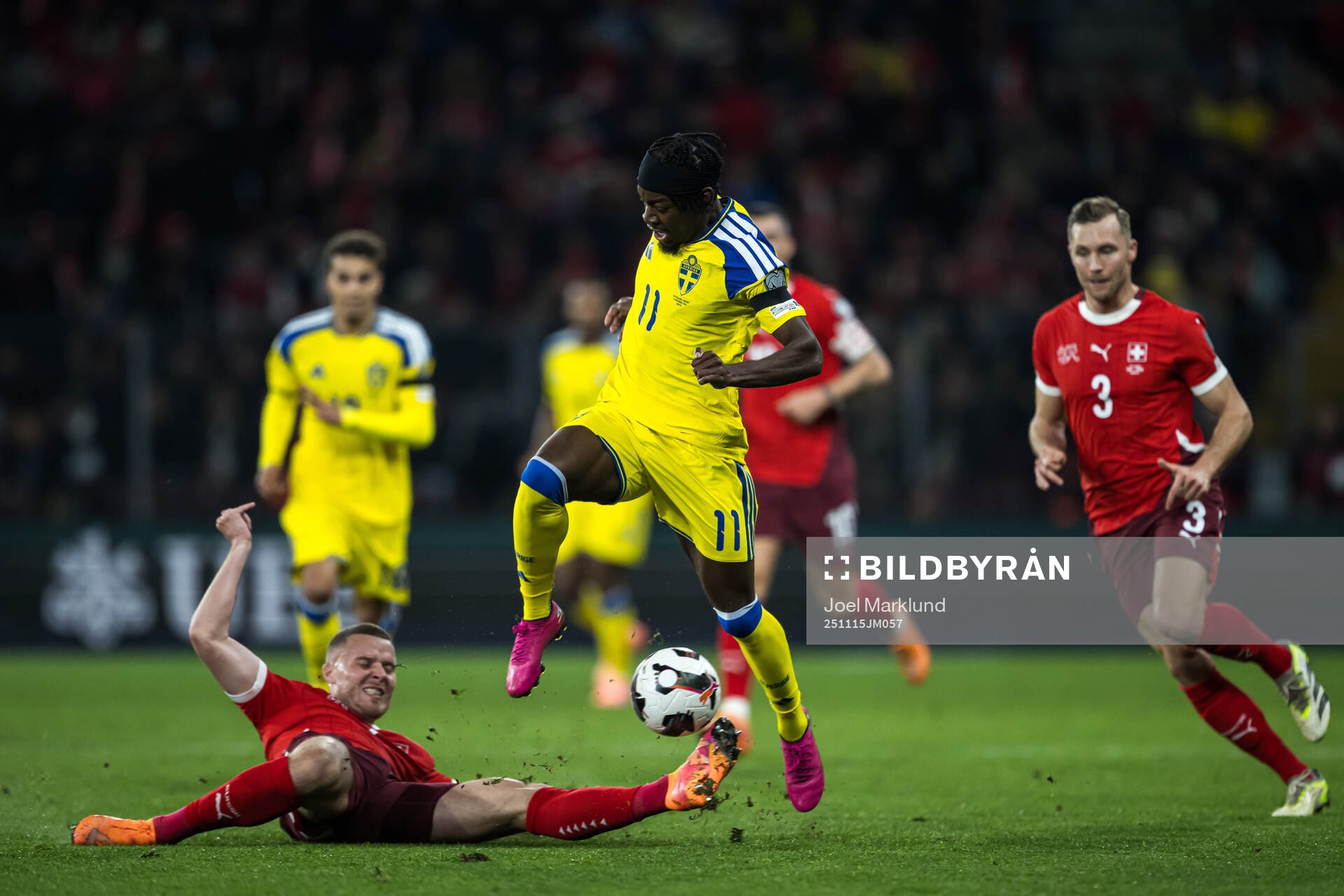 Nico Elvedi of Switzerland and Anthony Elanga of Sweden