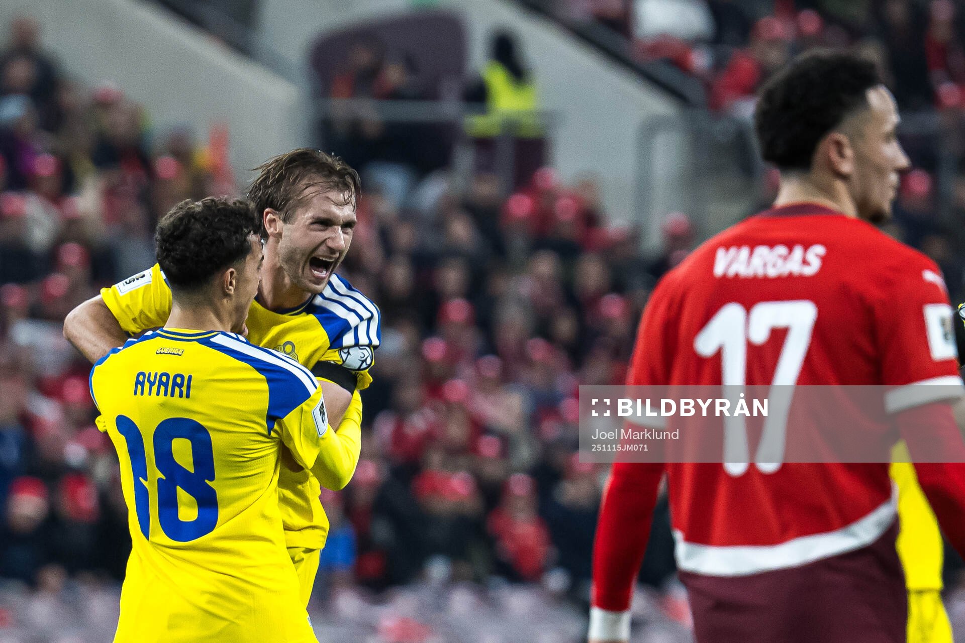 Yasin Ayari and Benjamin Nygren of Sweden celebrate the 1-1