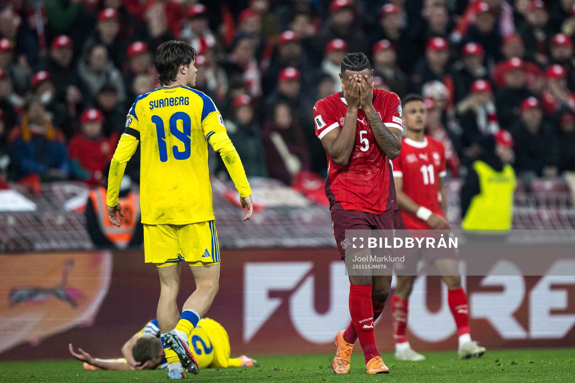 Manuel Akanji of Switzerland looks dejected