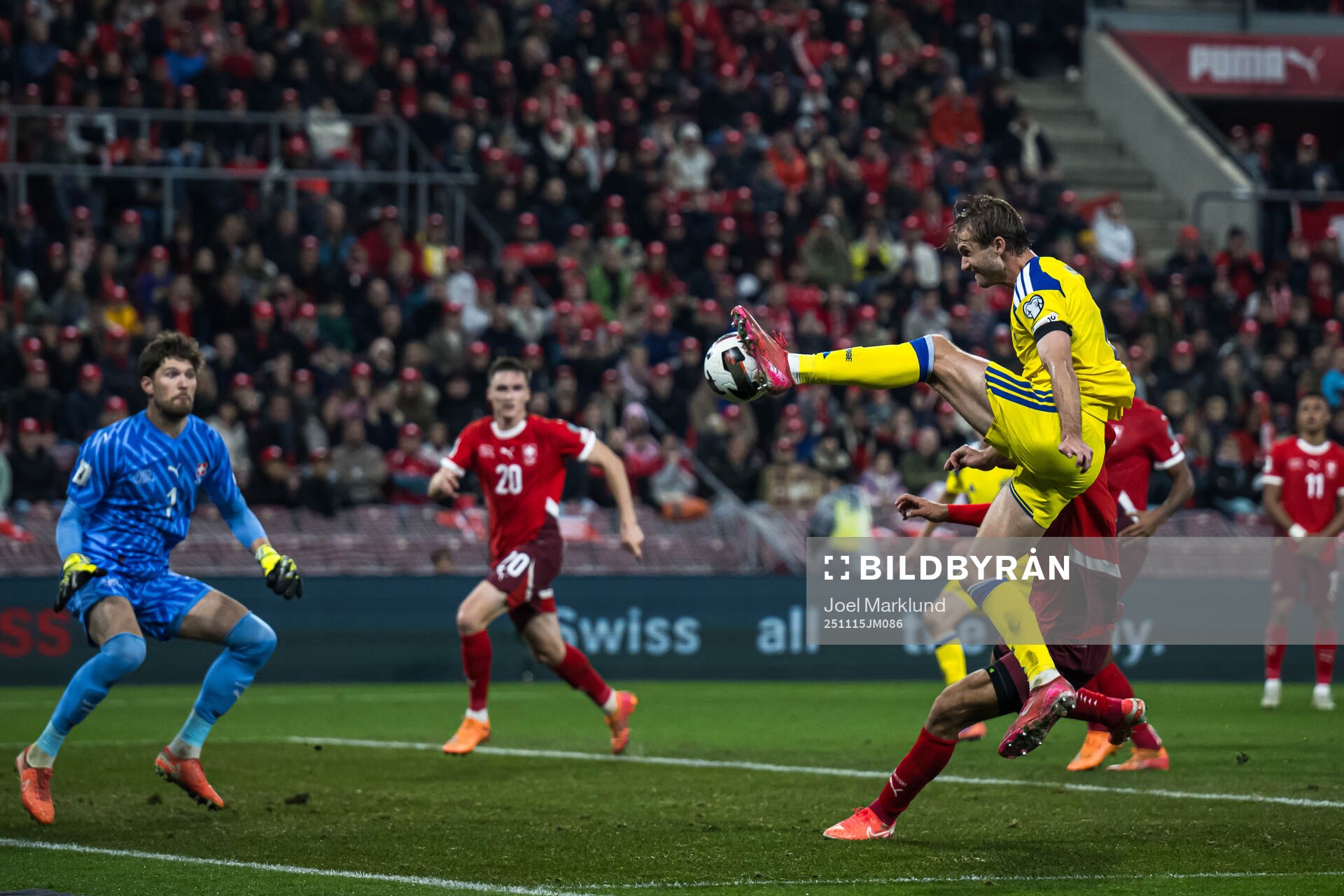 Benjamin Nygren of Sweden against goalkeeper Gregor Kobel