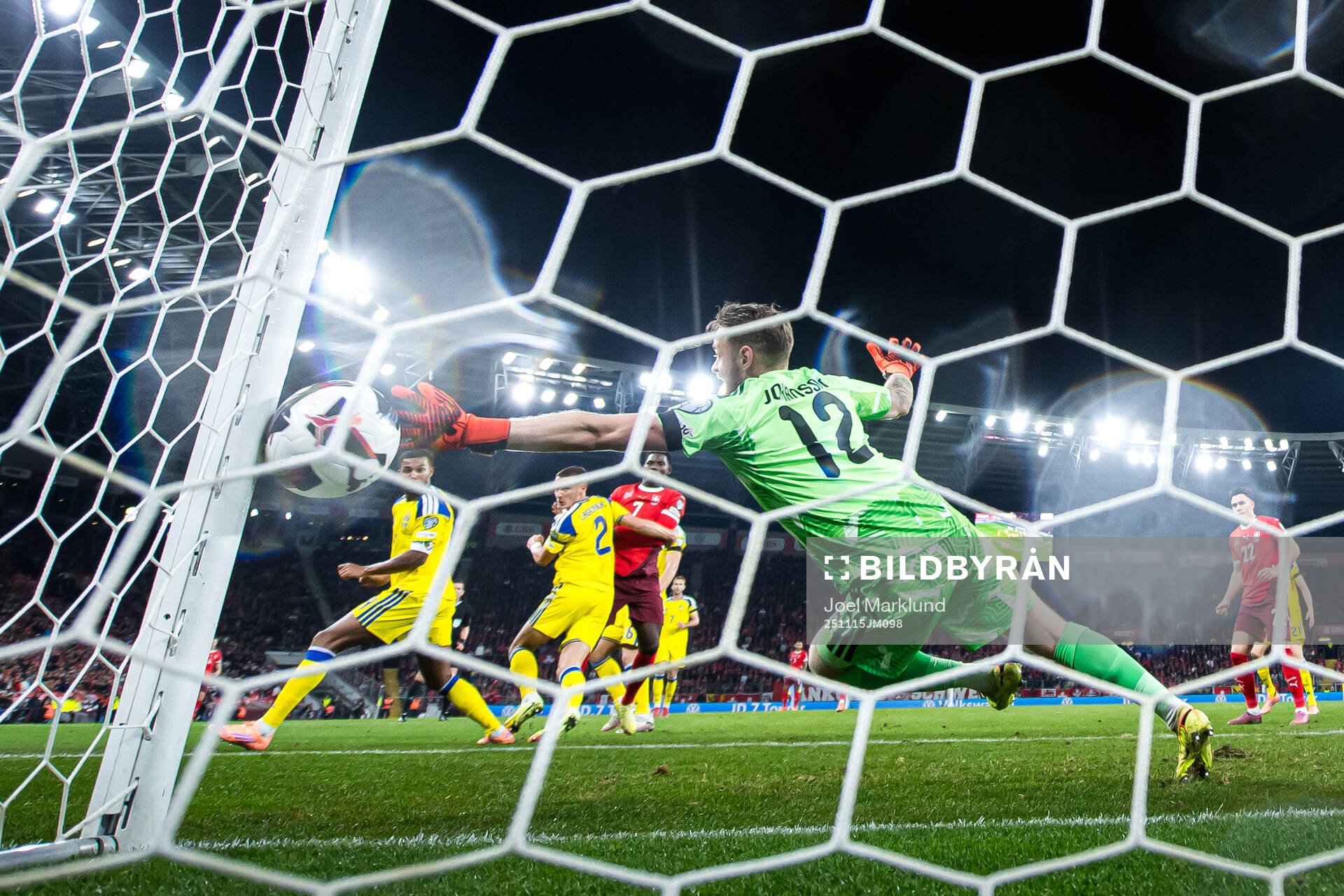 Breel Embolo of Switzerland scores the 1-0 goal behind
