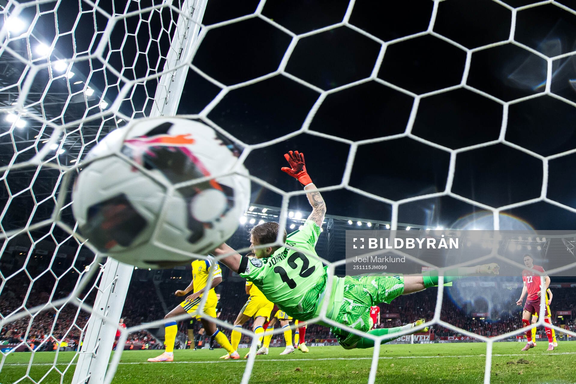 Breel Embolo of Switzerland scores the 1-0 goal behind
