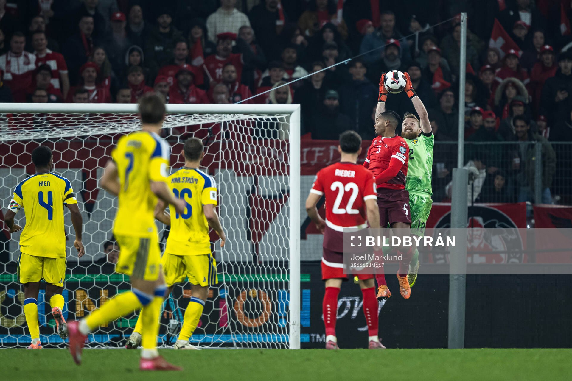 Manuel Akanji of Switzerland and goalkeeper Viktor