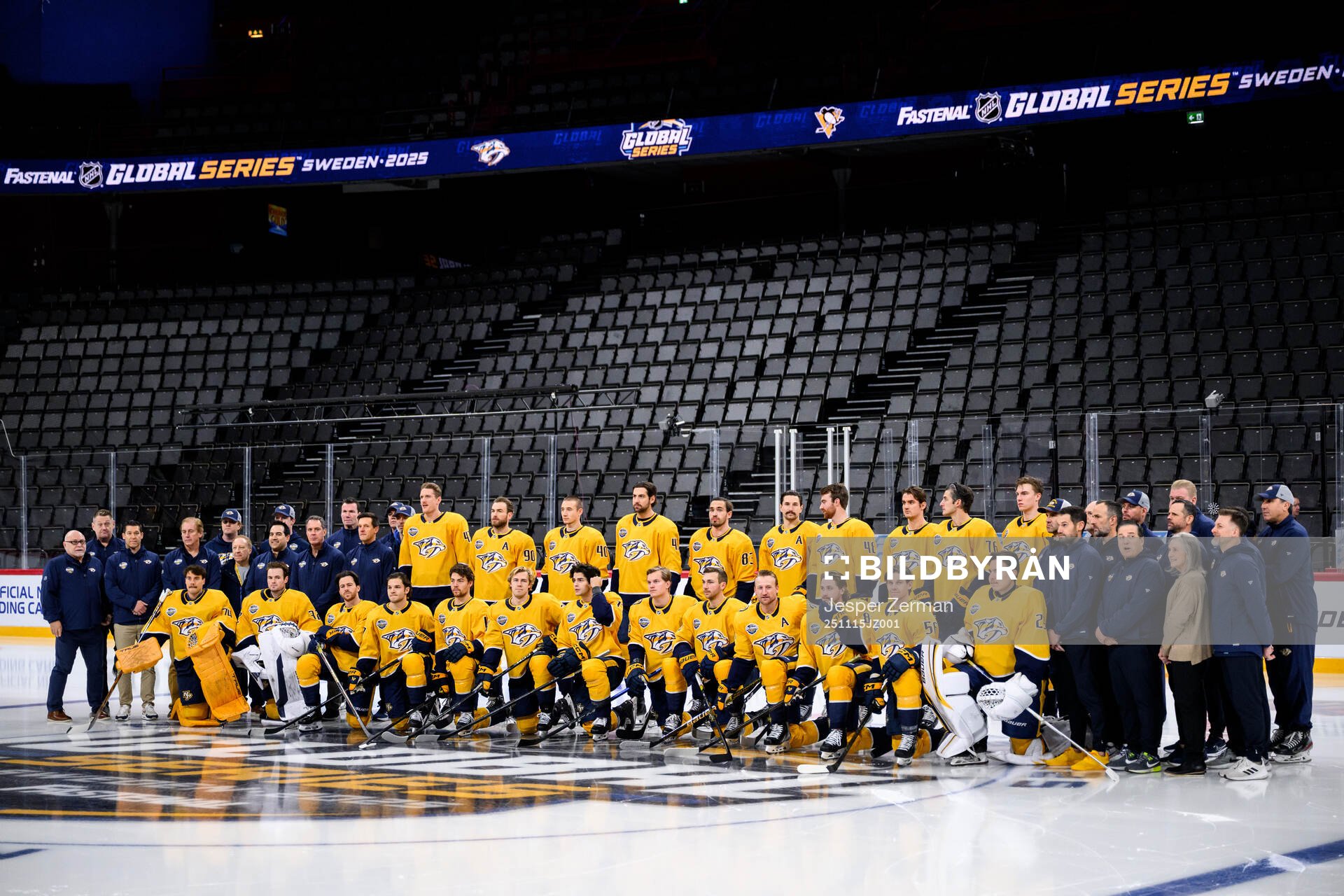 Players and staff of Nashville Predators pose for a team