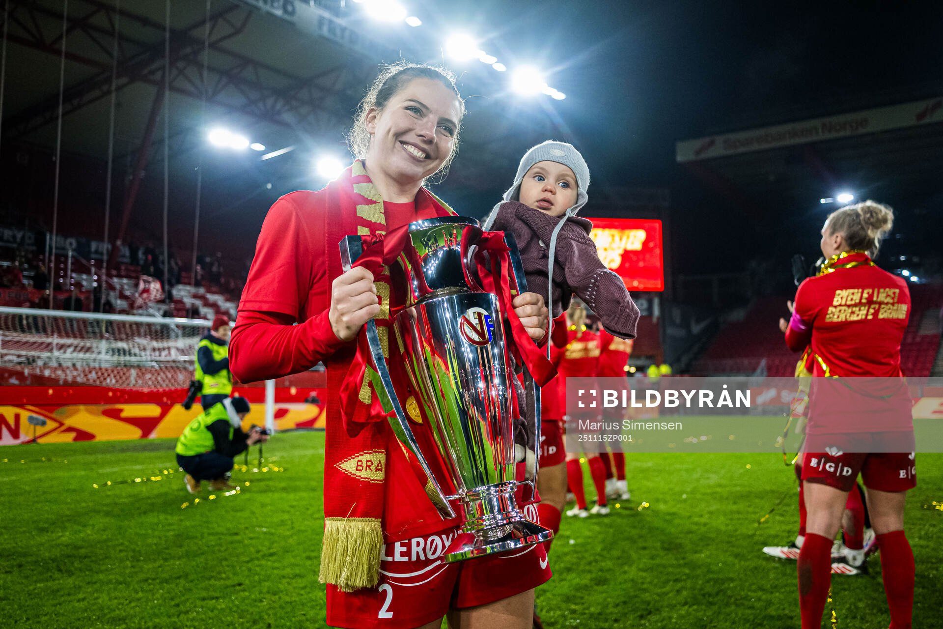 Cecilie Redisch Kvamme of Brann celebrates with the trophy