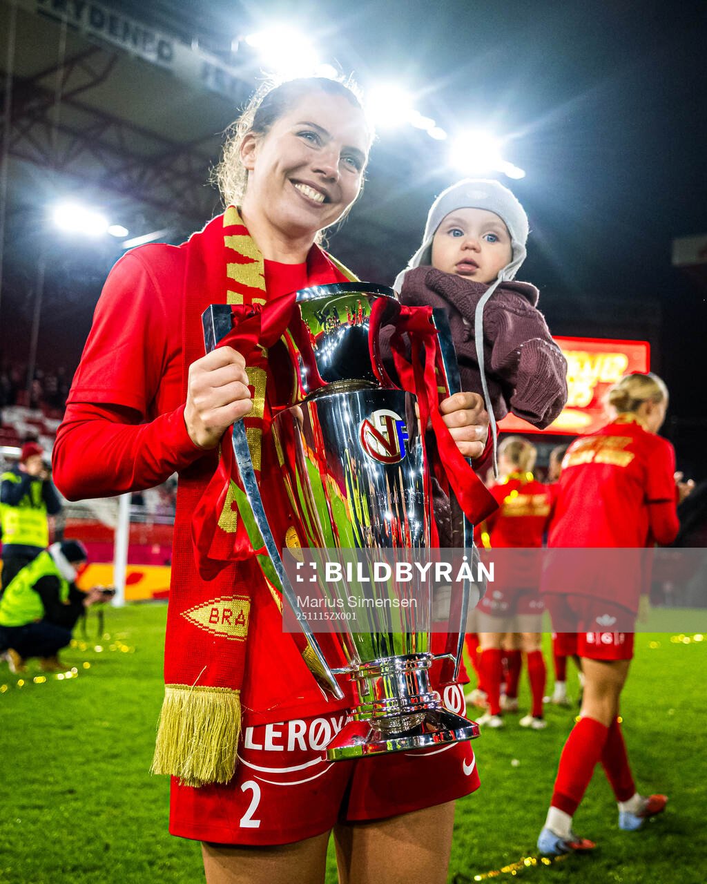 Cecilie Redisch Kvamme of Brann celebrates with the trophy