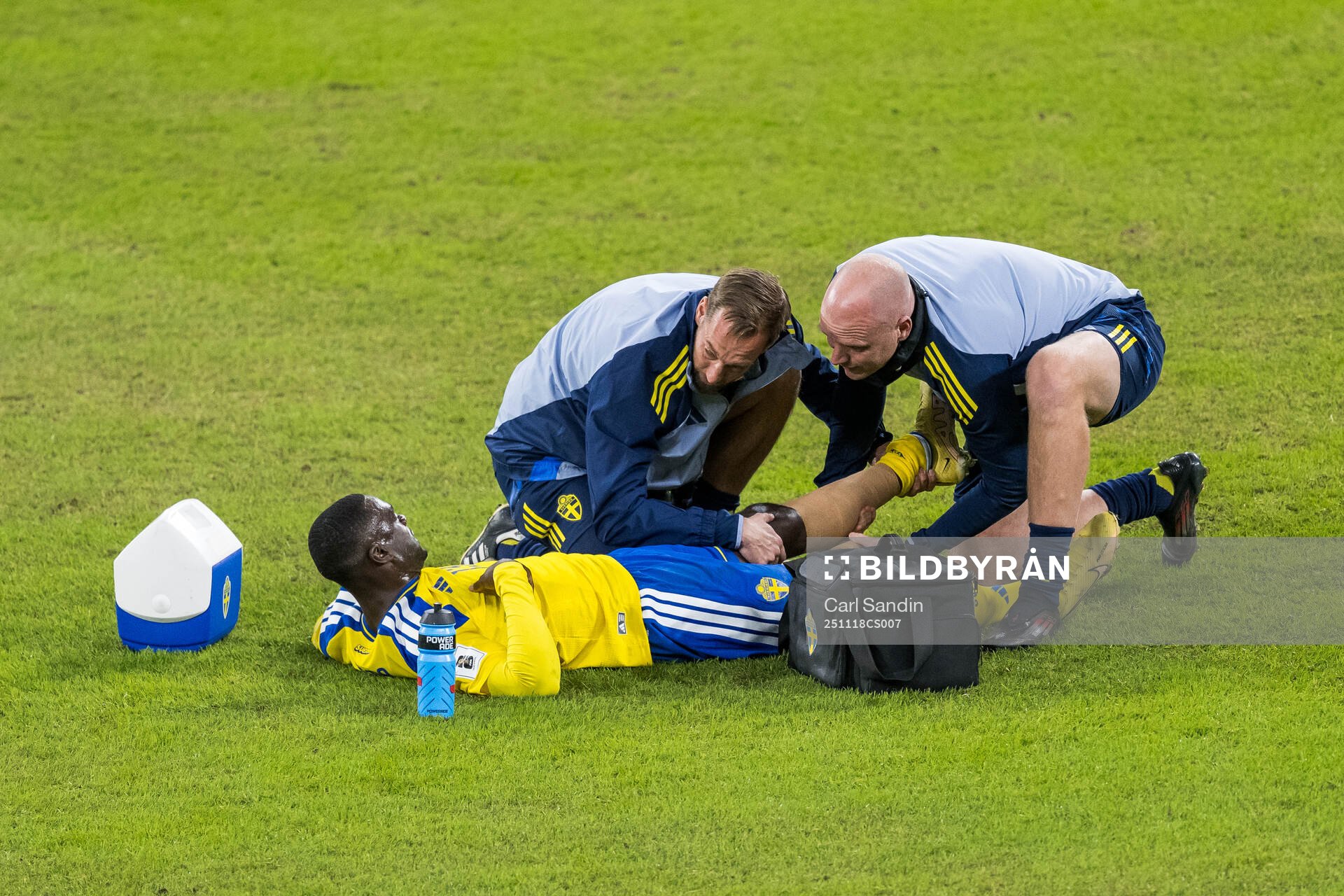 Ken Sema of Sweden receives medical attention