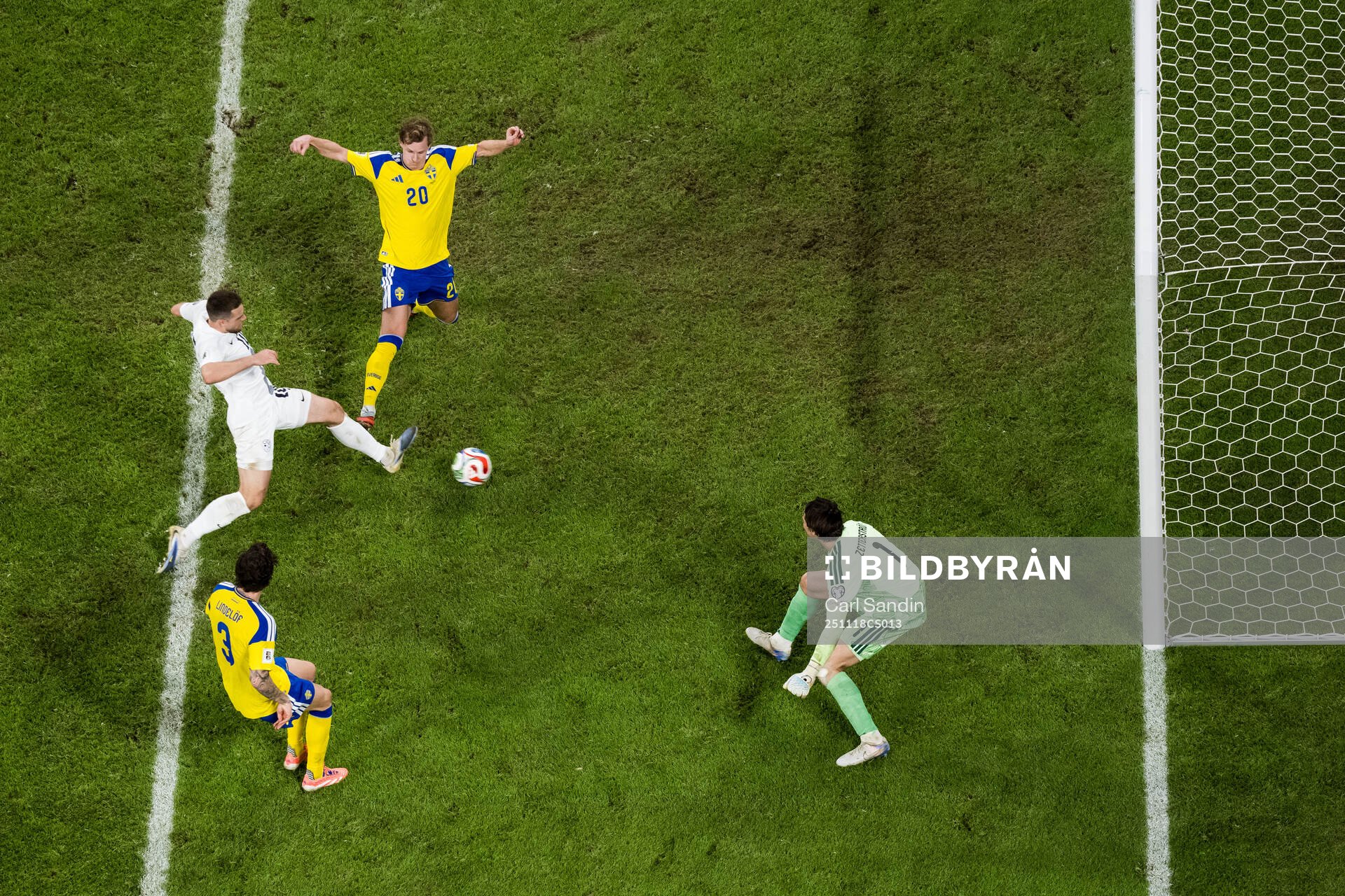 Timi Elsnik of Slovenia scores 0-1 behind Emil Krafth,
