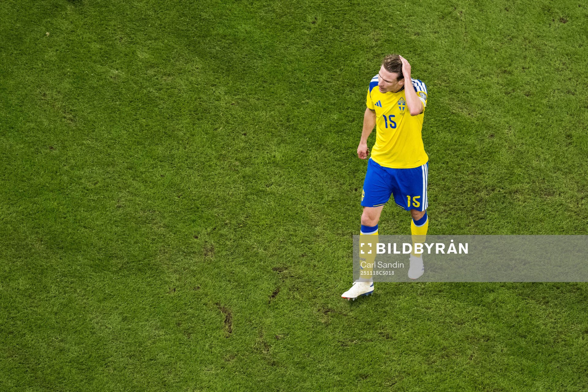 Carl Starfelt of Sweden looks dejected
