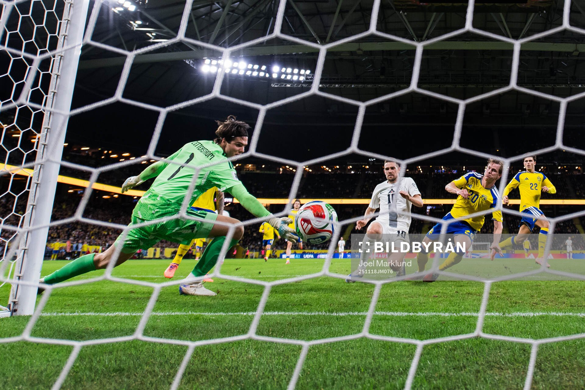 Timi Elsnik of Slovenia scores the 0-1 goal behind
