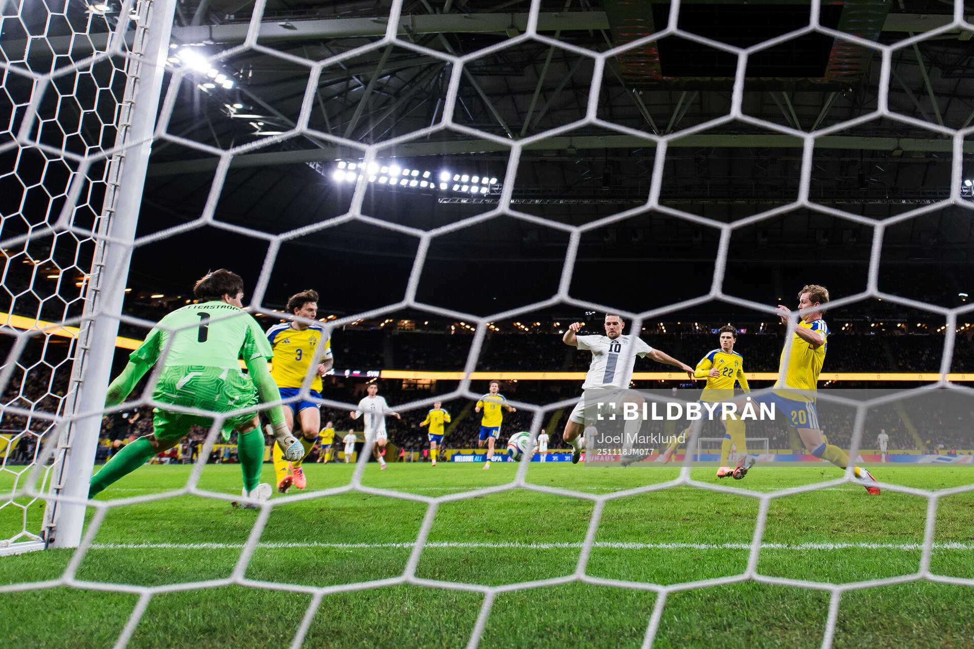 Timi Elsnik of Slovenia scores the 0-1 goal behind