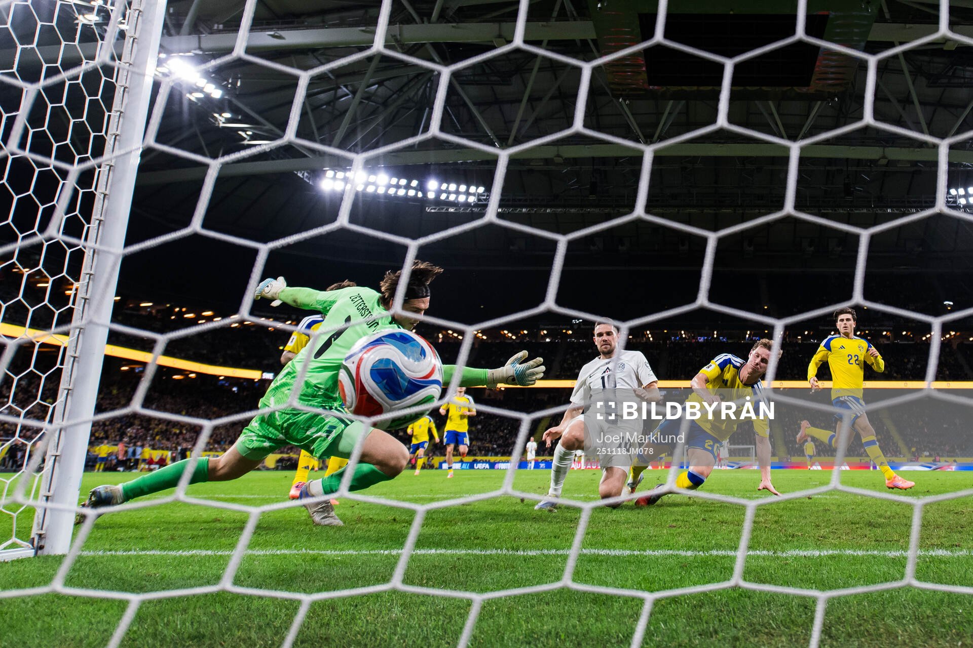 Timi Elsnik of Slovenia scores the 0-1 goal behind