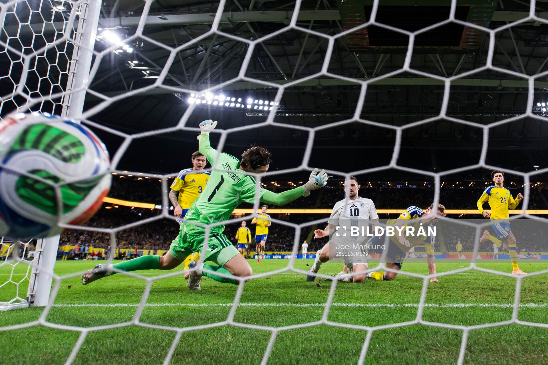 Timi Elsnik of Slovenia scores the 0-1 goal behind