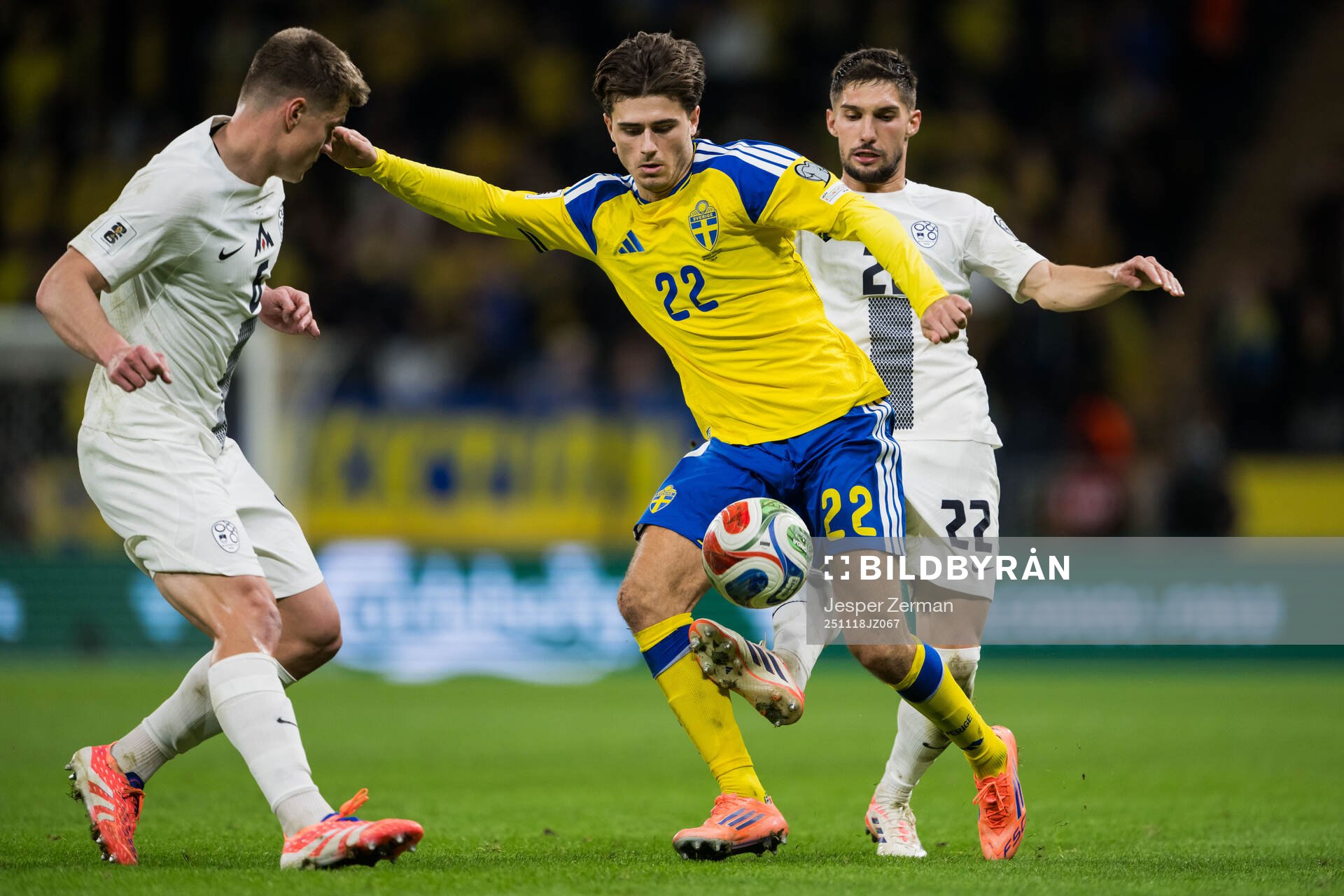 Besfort Zeneli of Sweden against Jaka Bijol and Adam Gnezda