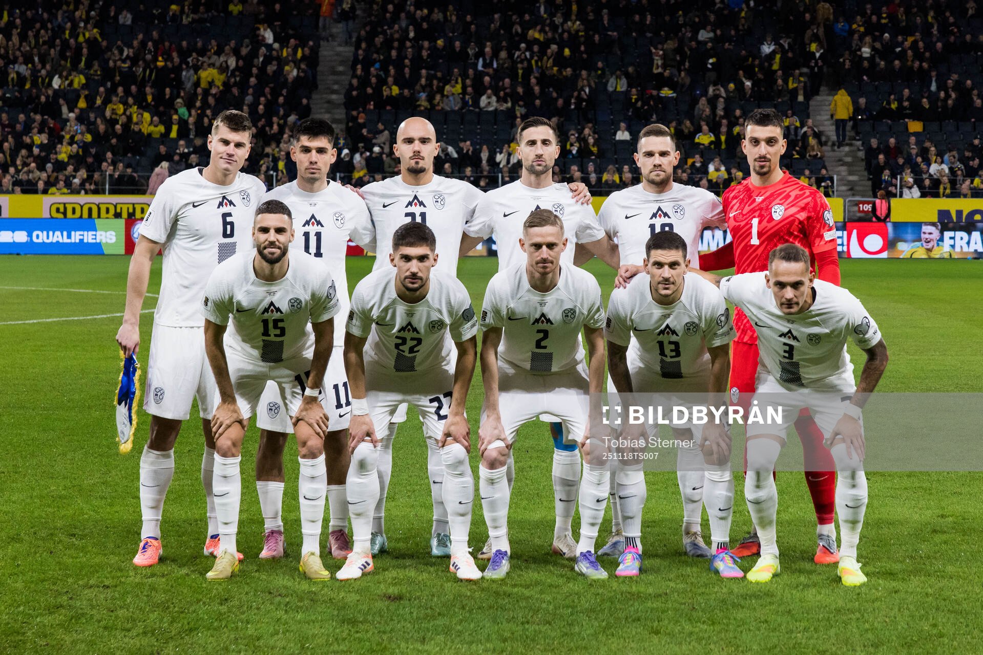 The starting eleven of Slovenia pose for a team photo