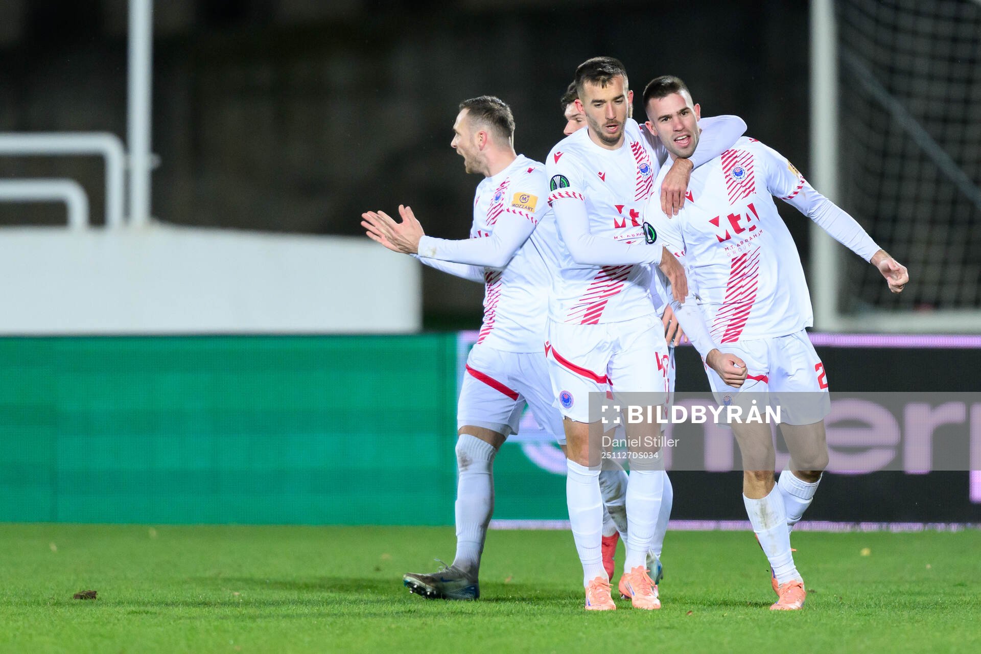 Mario Cuže of Zrinjski Mostar celebrate with teammates