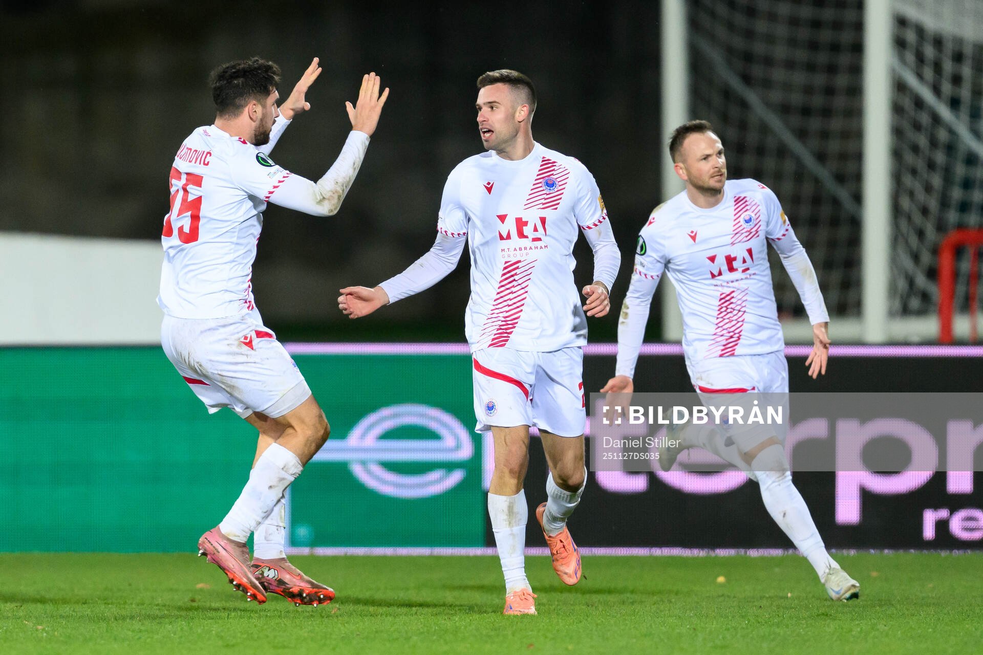 Mario Cuže of Zrinjski Mostar celebrate with teammates