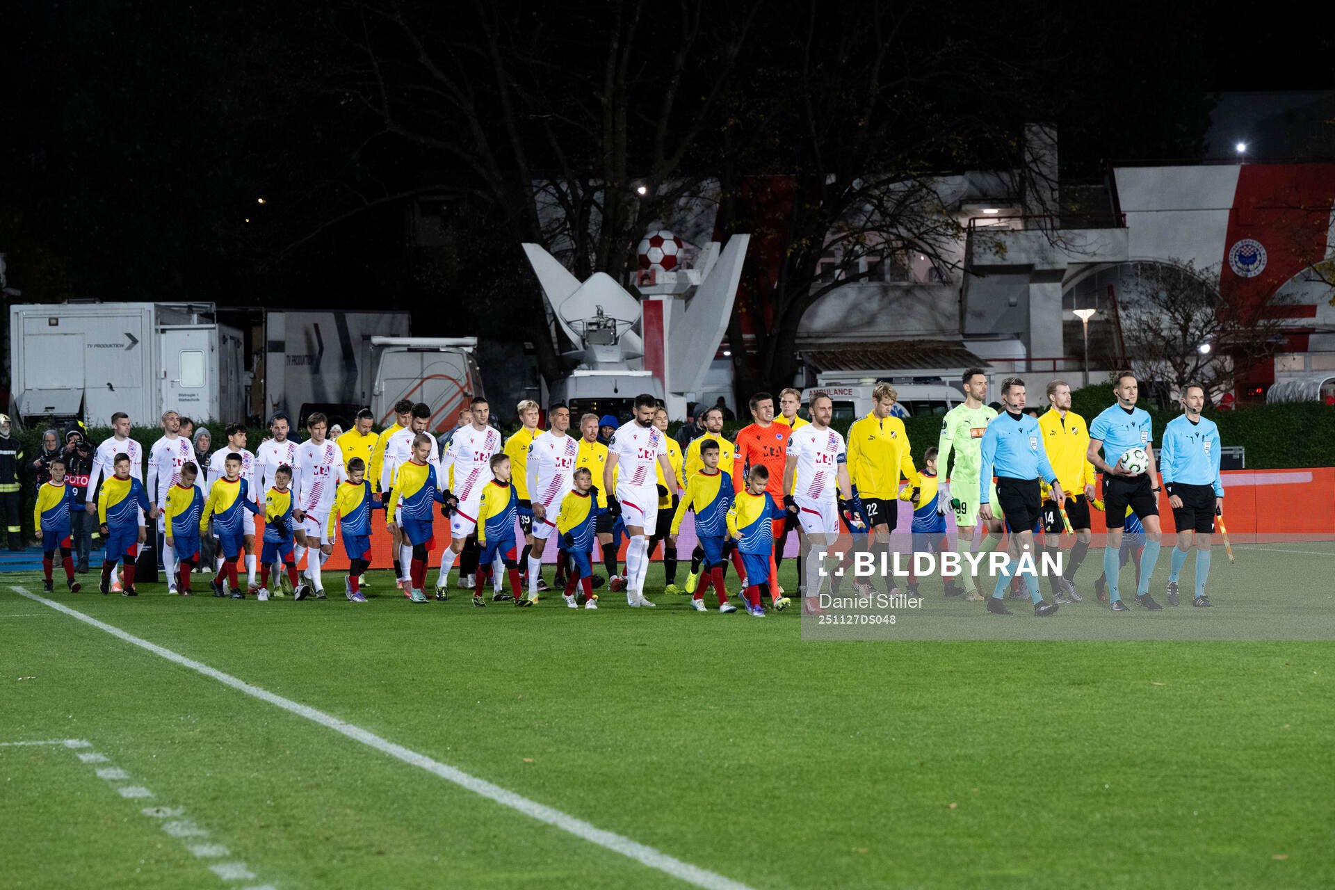 The team enters the arena