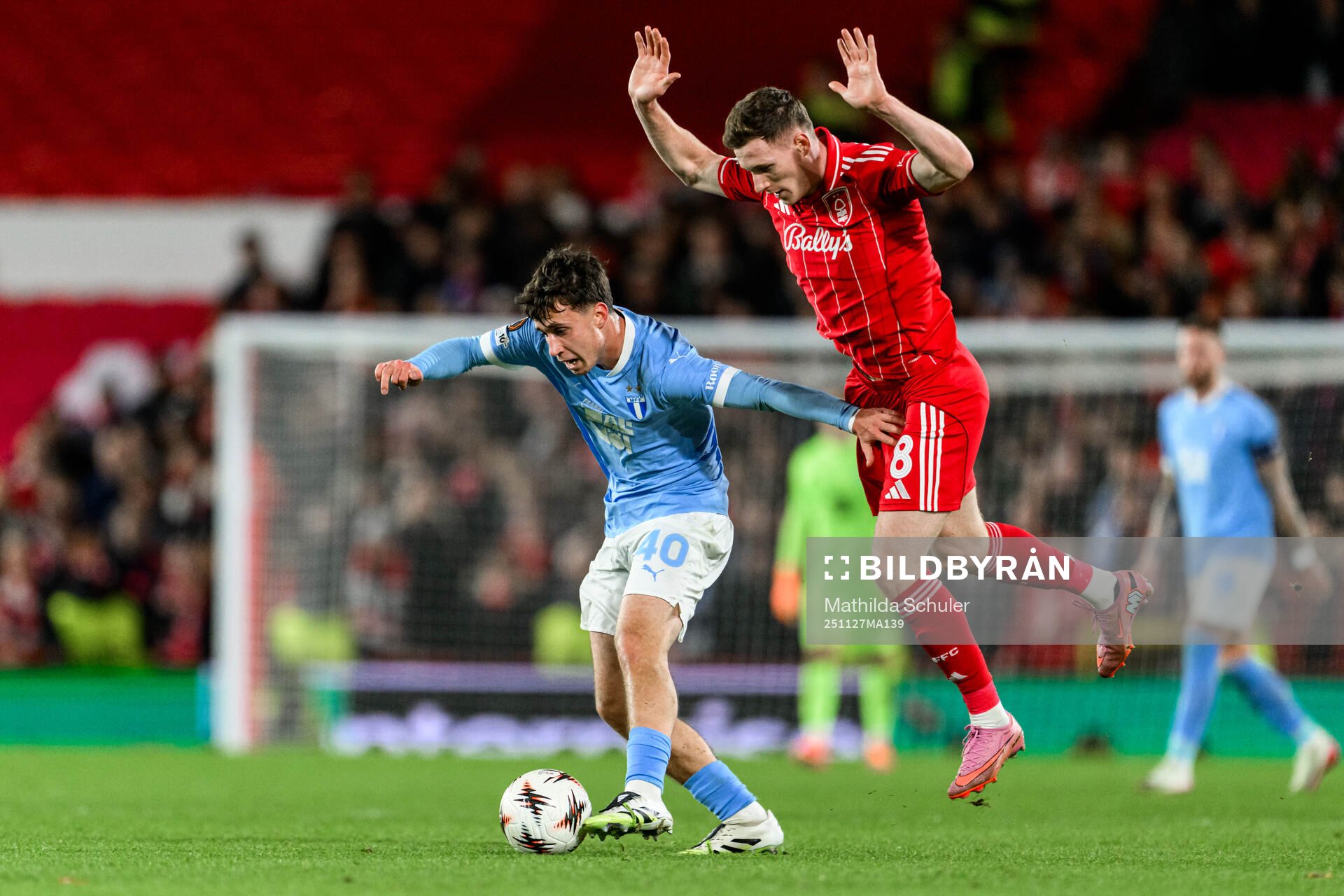 Kenan Busuladzic of Malmö FF and Elliot Anderson of