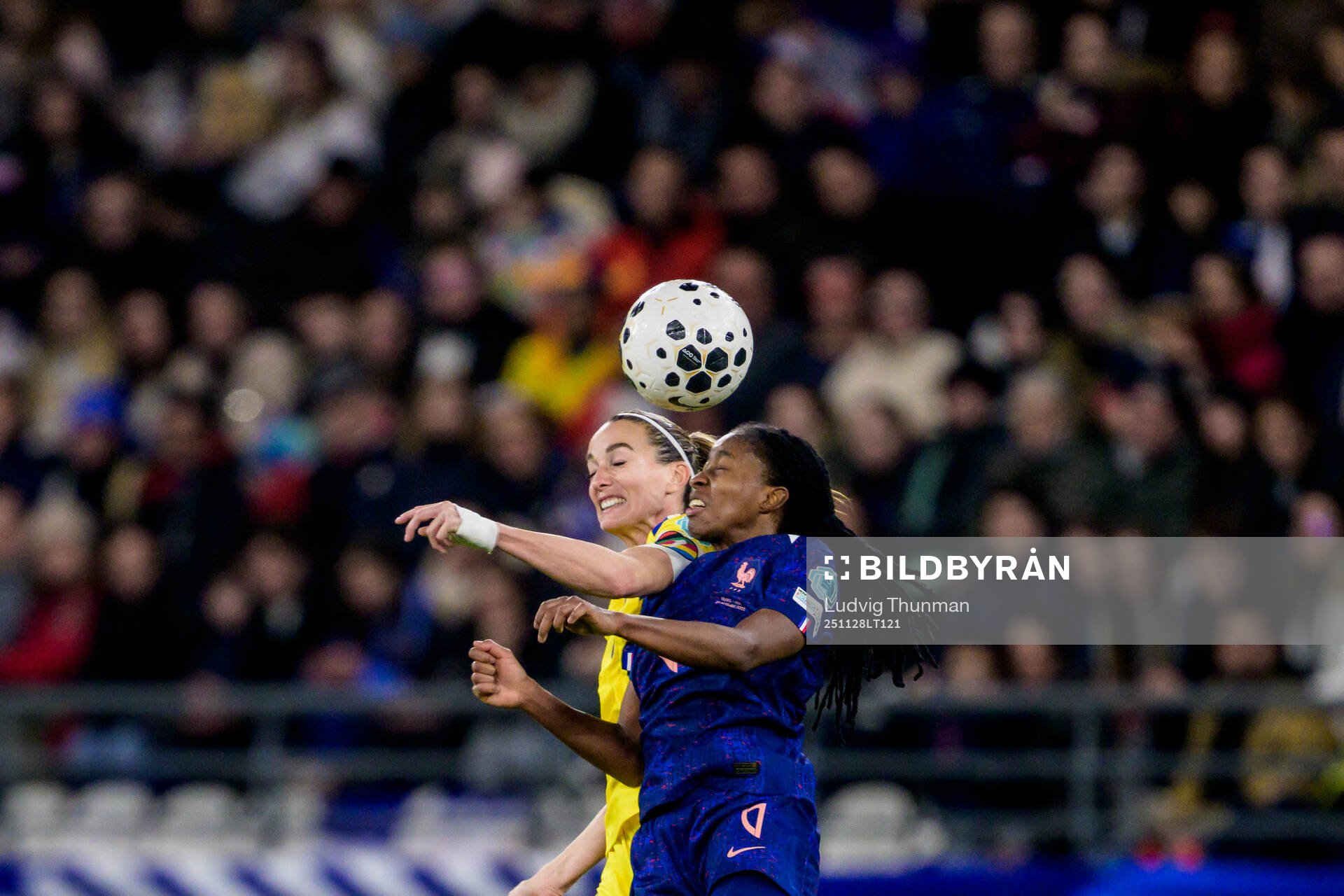 Kosovare Asllani of Sweden and Oriane Jean-Francois of