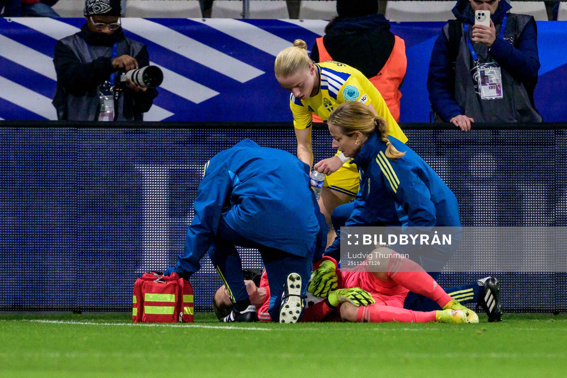 Goalkeeper Jennifer Falk of Sweden receives medical