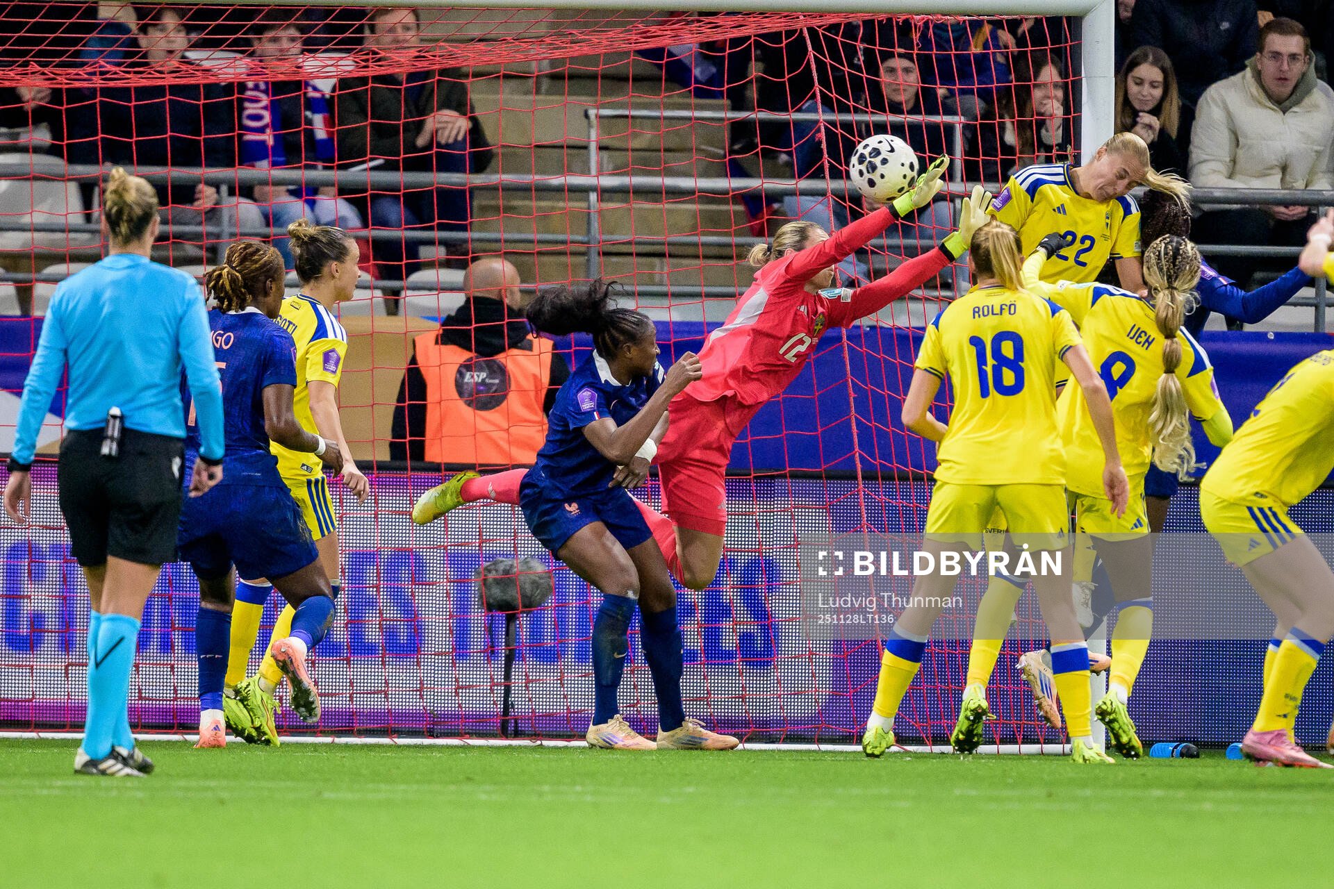 Griedge Mbock Bathy of France scores 2-1 behind goalkeeper