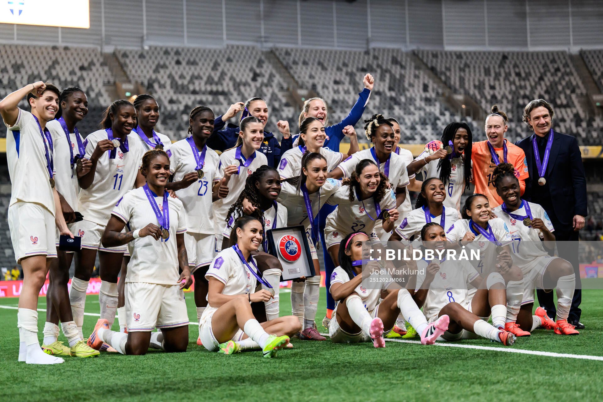 Players of France celebrate with their bronze medals