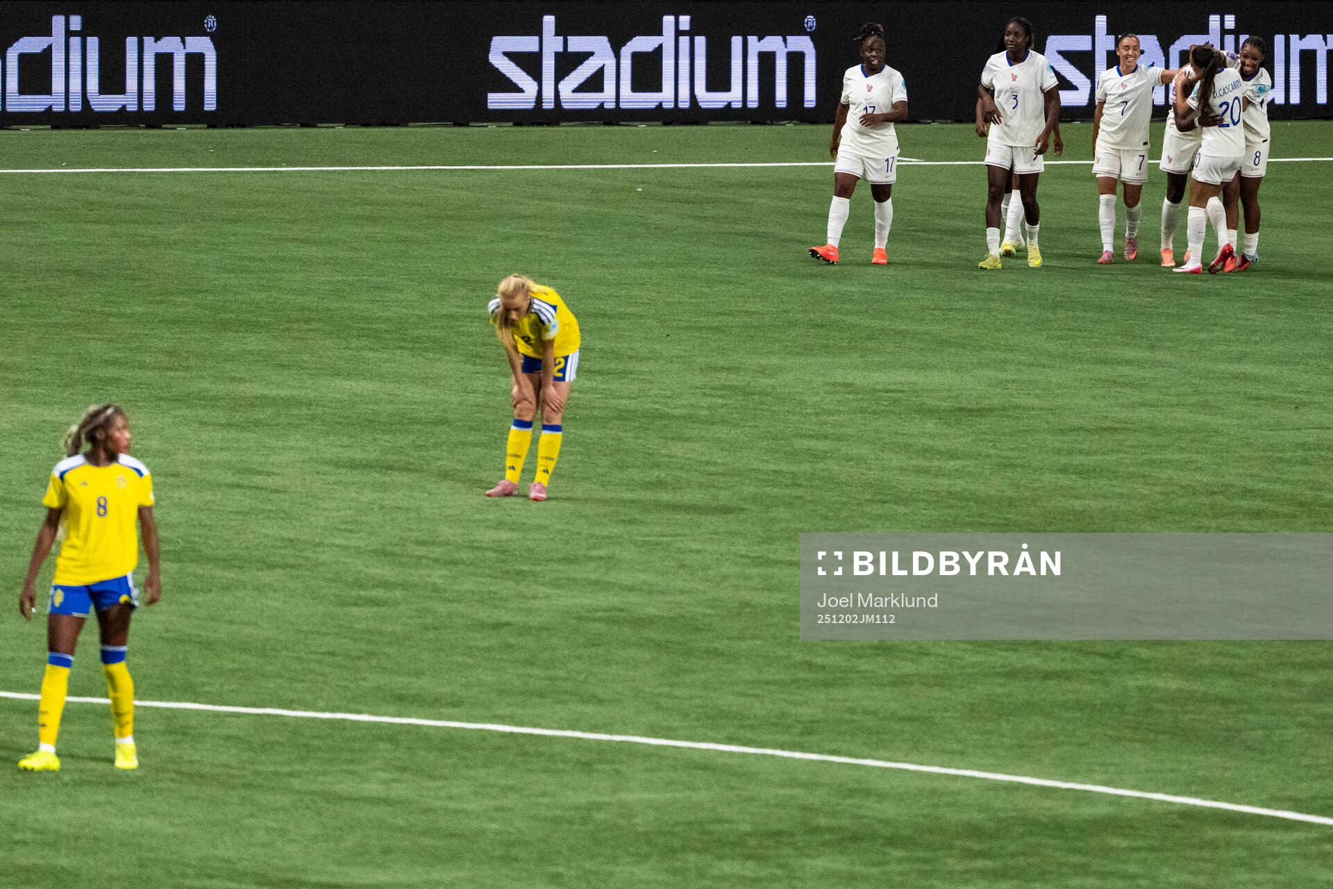 Evelyn Ijeh and Smilla Holmberg of Sweden look dejected