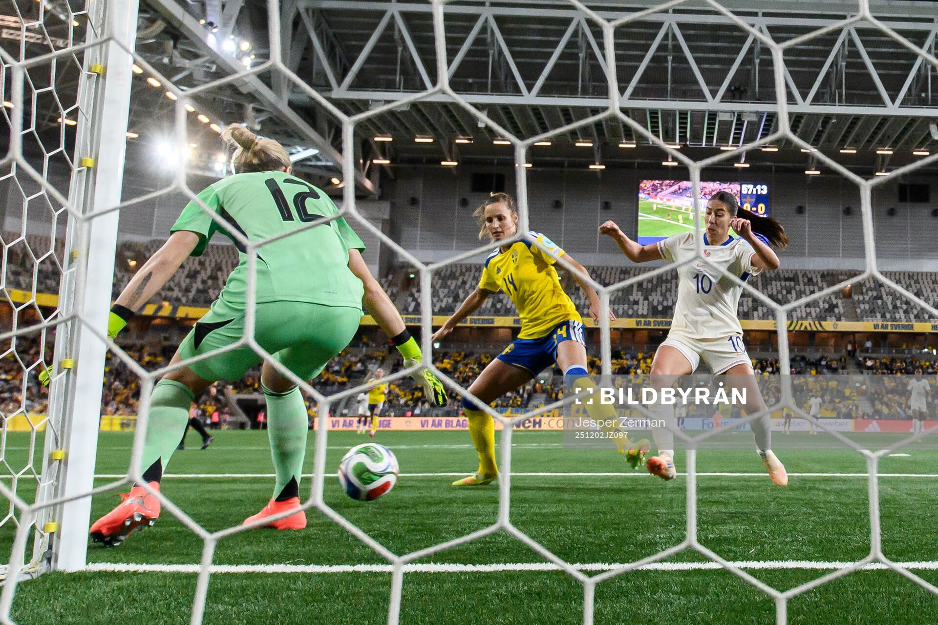 goalkeeper Jennifer Falk and Nathalie Björn of Sweden