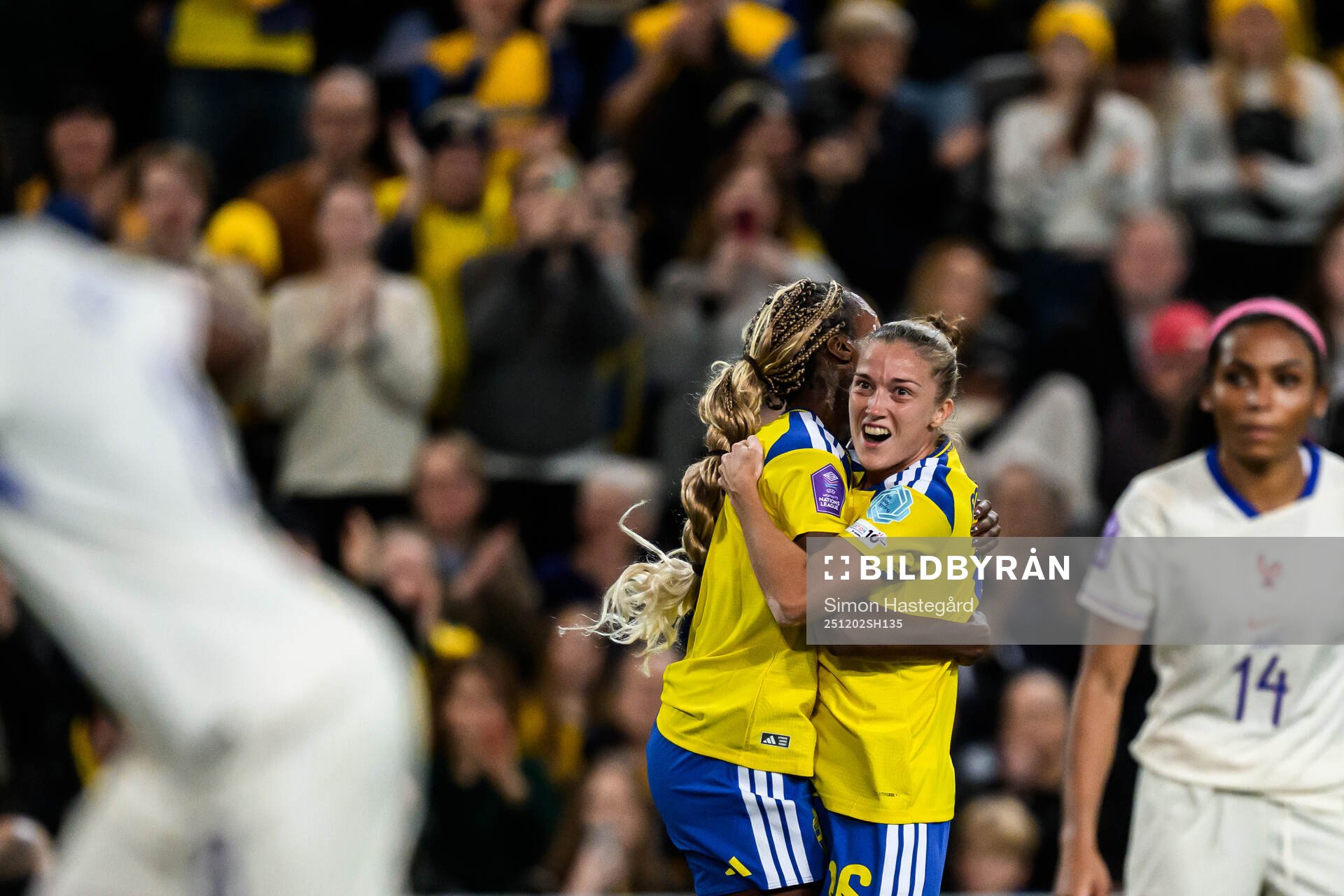Evelyn Ijeh and Filippa Angeldahl of Sweden celebrate the