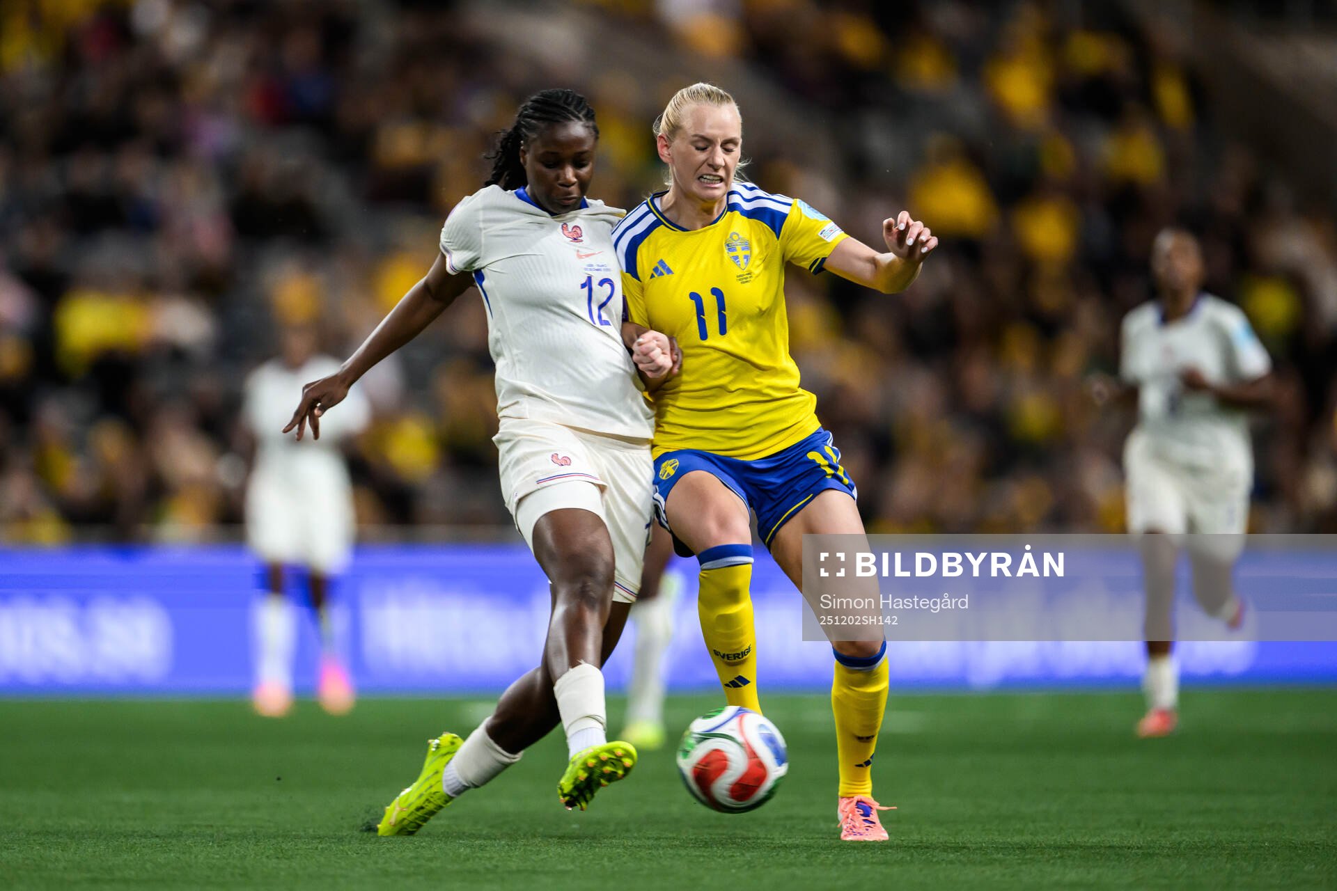 Wassa Sangaré of France and Stina Blackstenius of Sweden