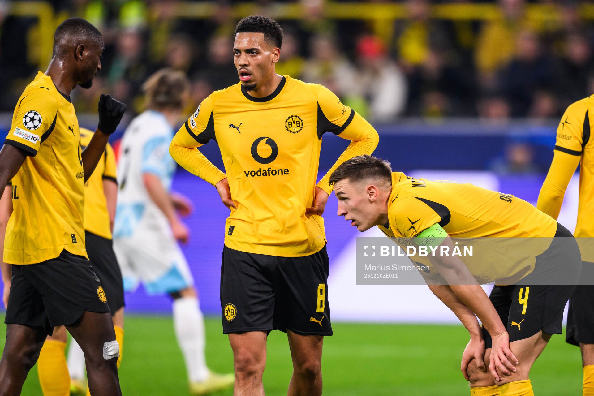 Felix Nmecha and Nico Schlotterbeck  of Borussia Dortmund