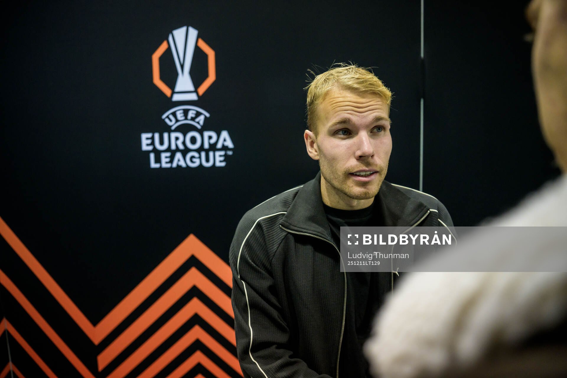 Oscar Lewicki of Malmö FF is being interviewed by the media