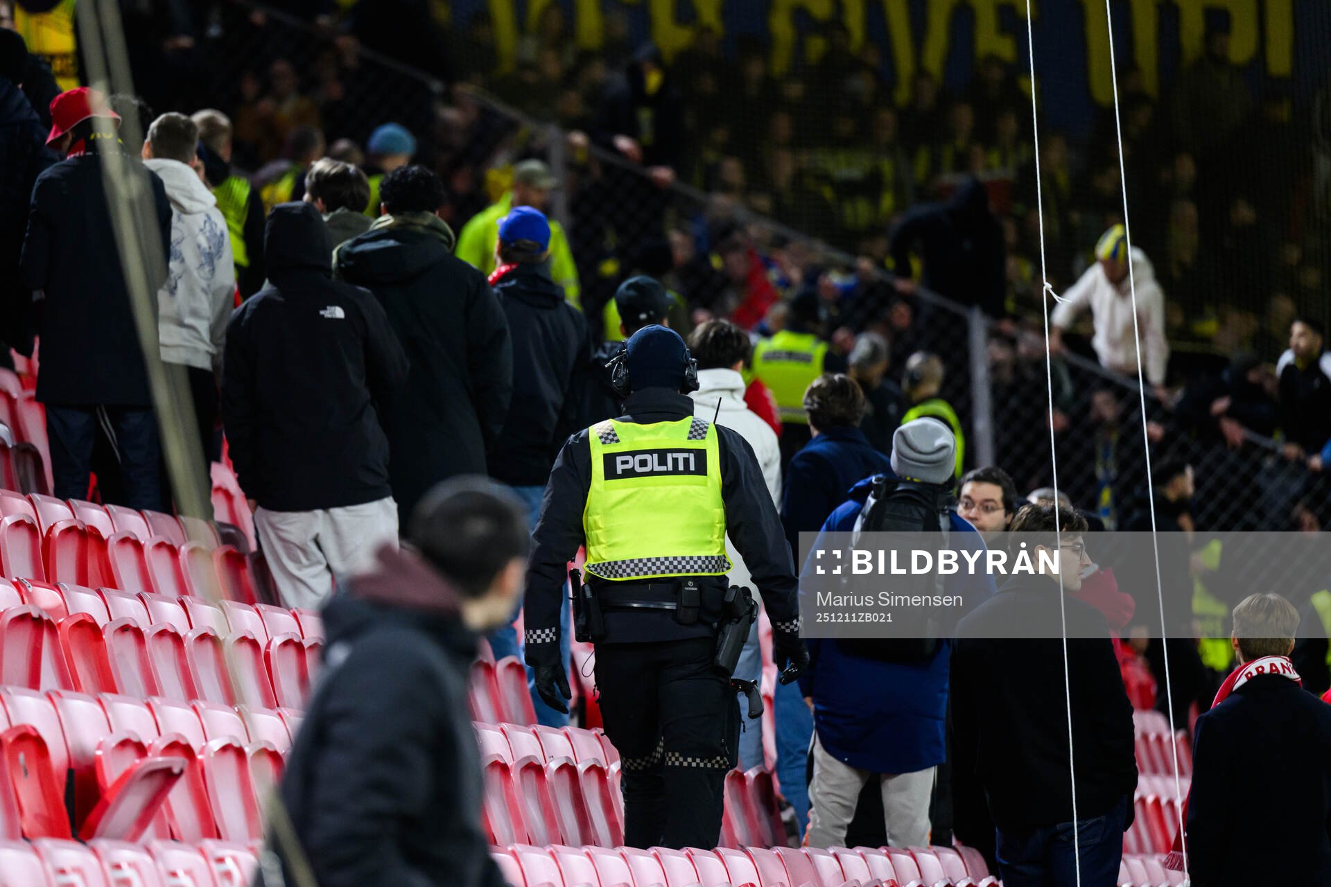 A police in the stands