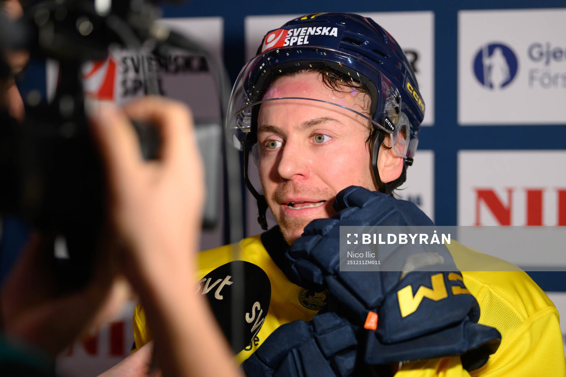 Pär Lindholm of Sweden in the ice hockey game between