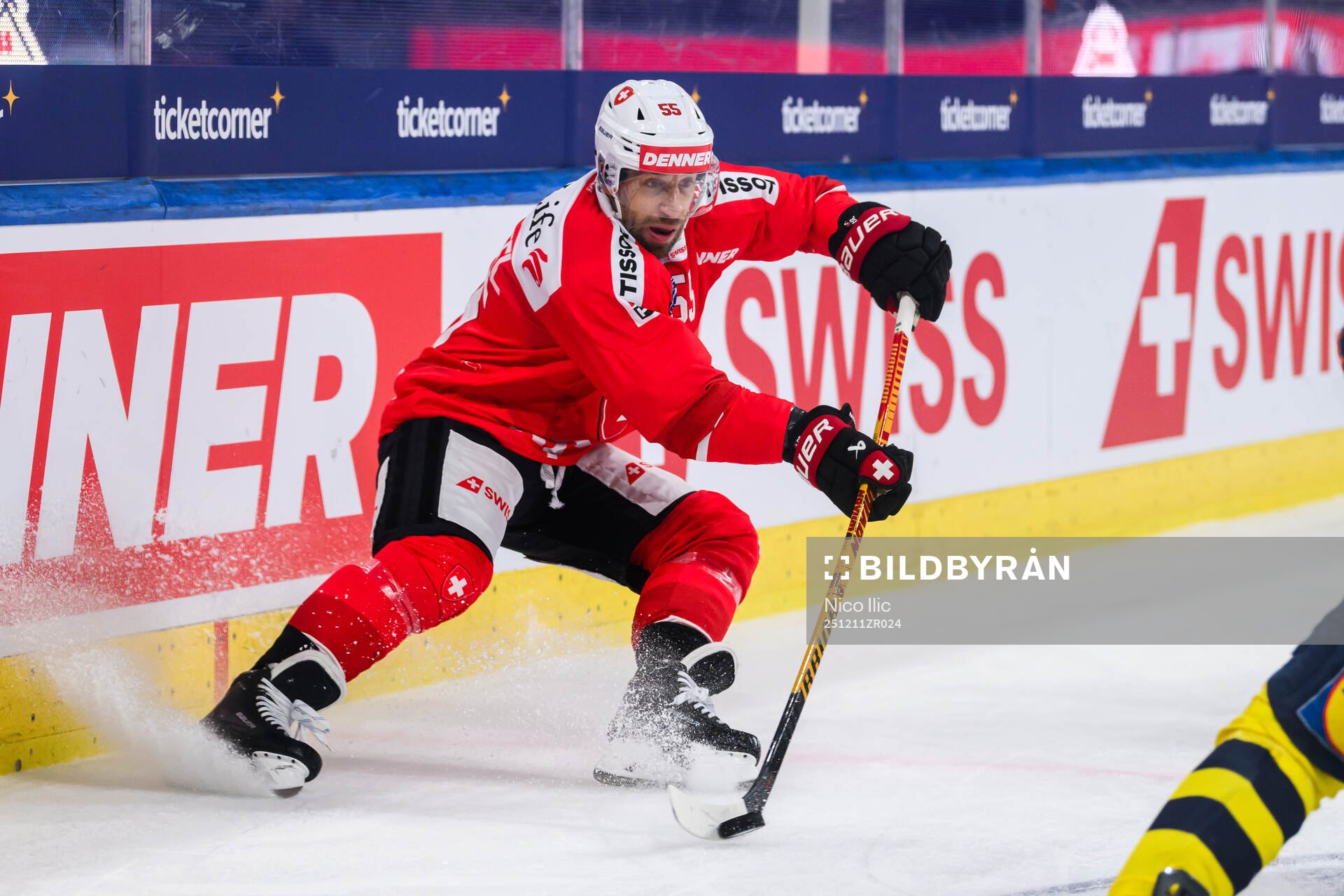 Romain Loeffel  of Switzerland in the ice hockey game