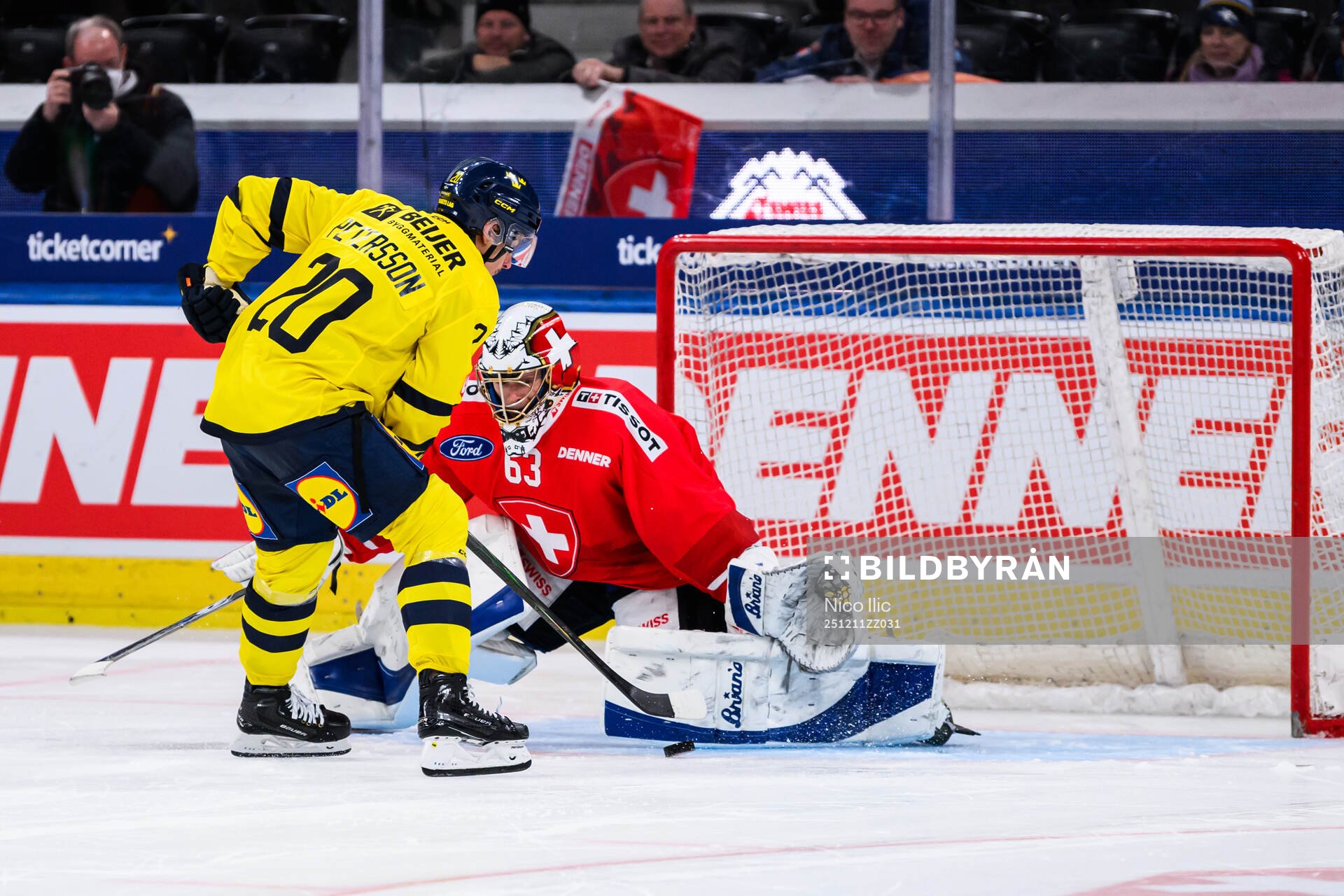Andre Petersson of Sweden and goalkeeper Leonardo Genoni