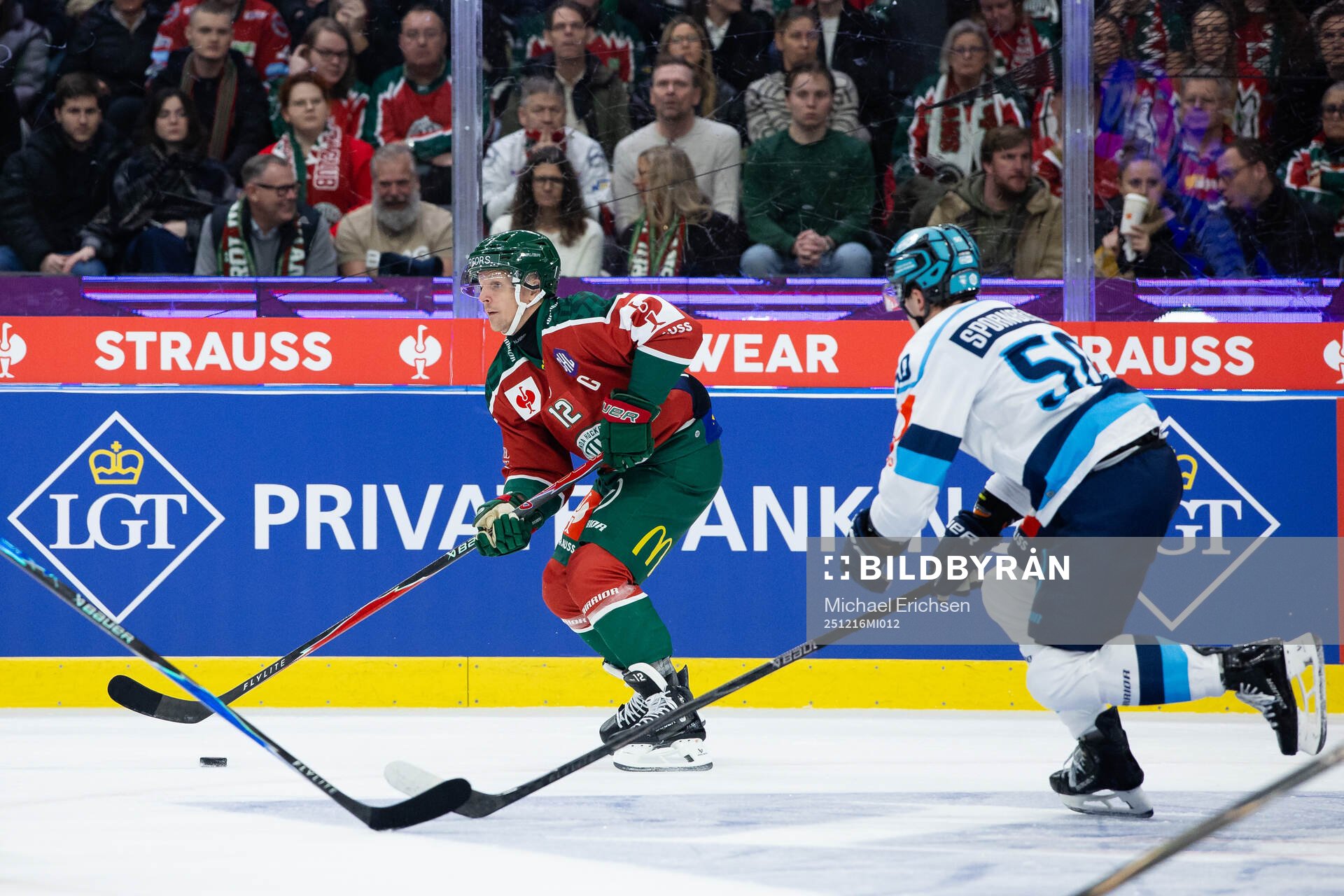 Max Friberg of Frölunda and Peter Spornberger of Ingolstadt