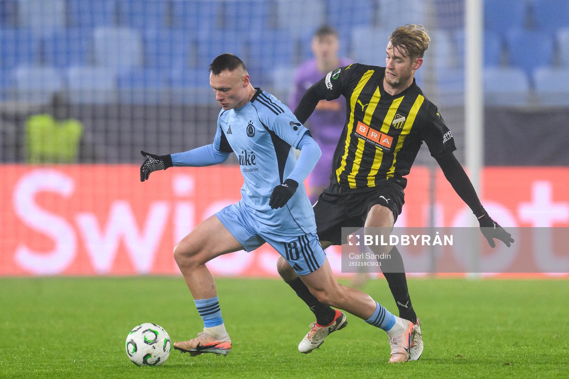 Nino Marcelli of Slovan Bratislava and Filip Helander of