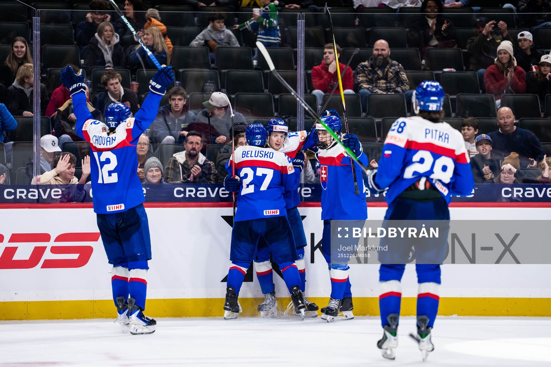 Tobias Tomik of Slovakia celebrates with team mates