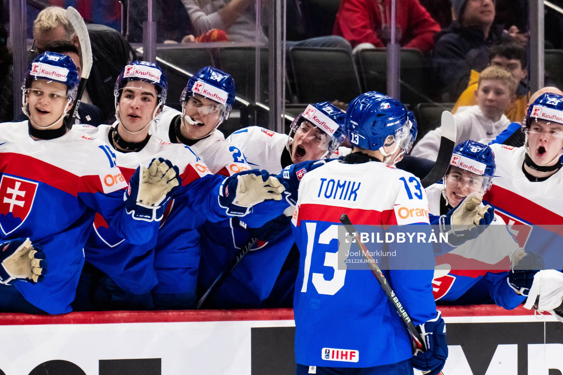 Tobias Tomik of Slovakia celebrates with team mates