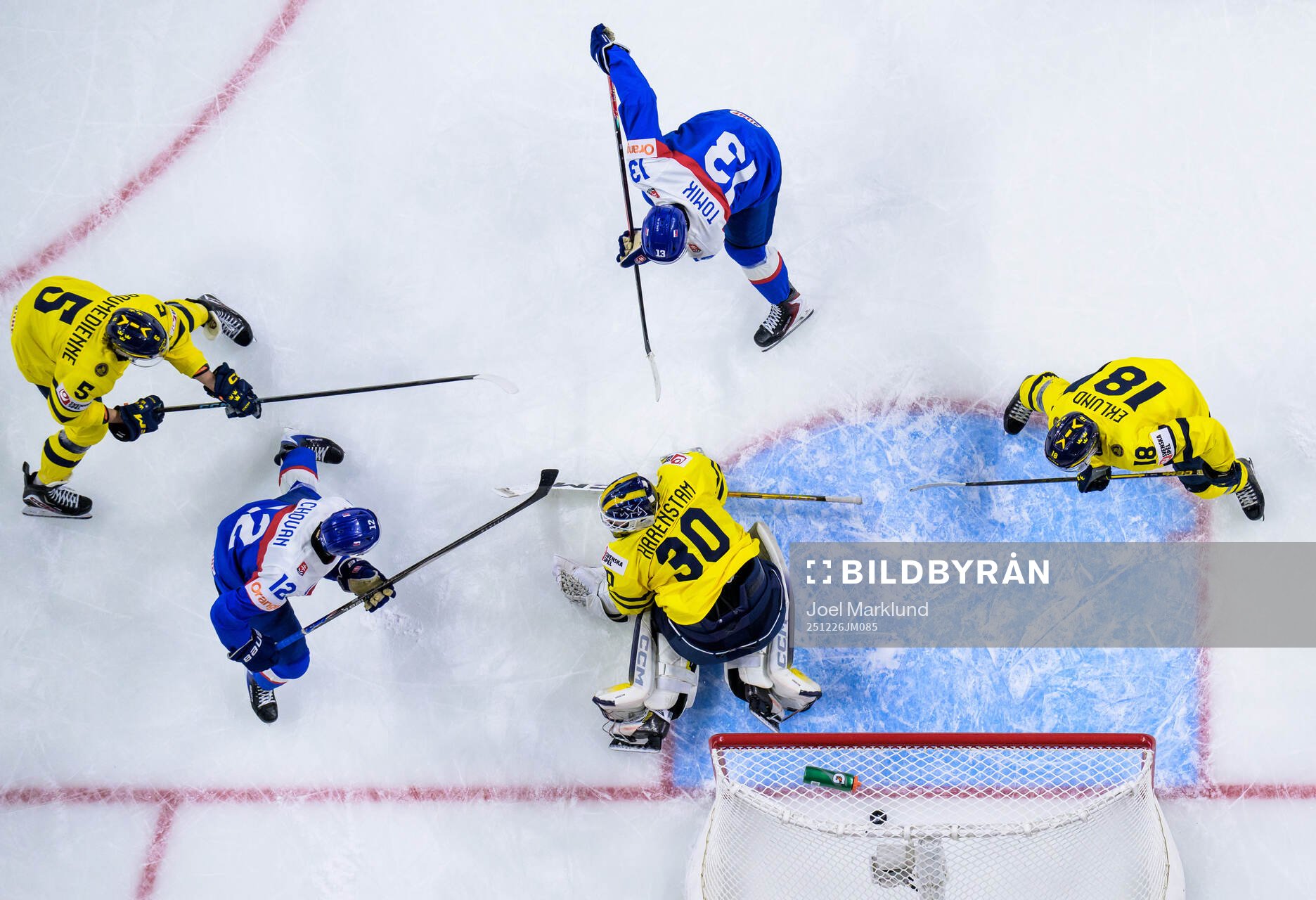 Tobias Tomik of Slovakia scores the 2-2 goal behind