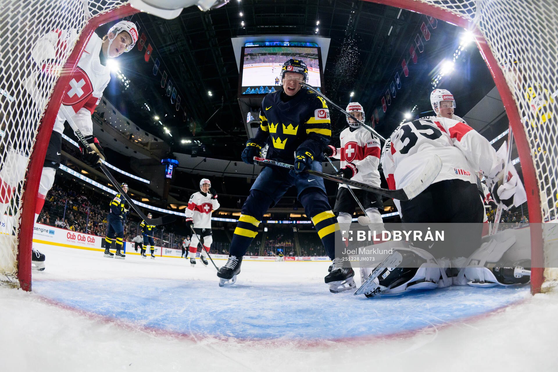 Milton Gästrin of Sweden gets a stick in his face