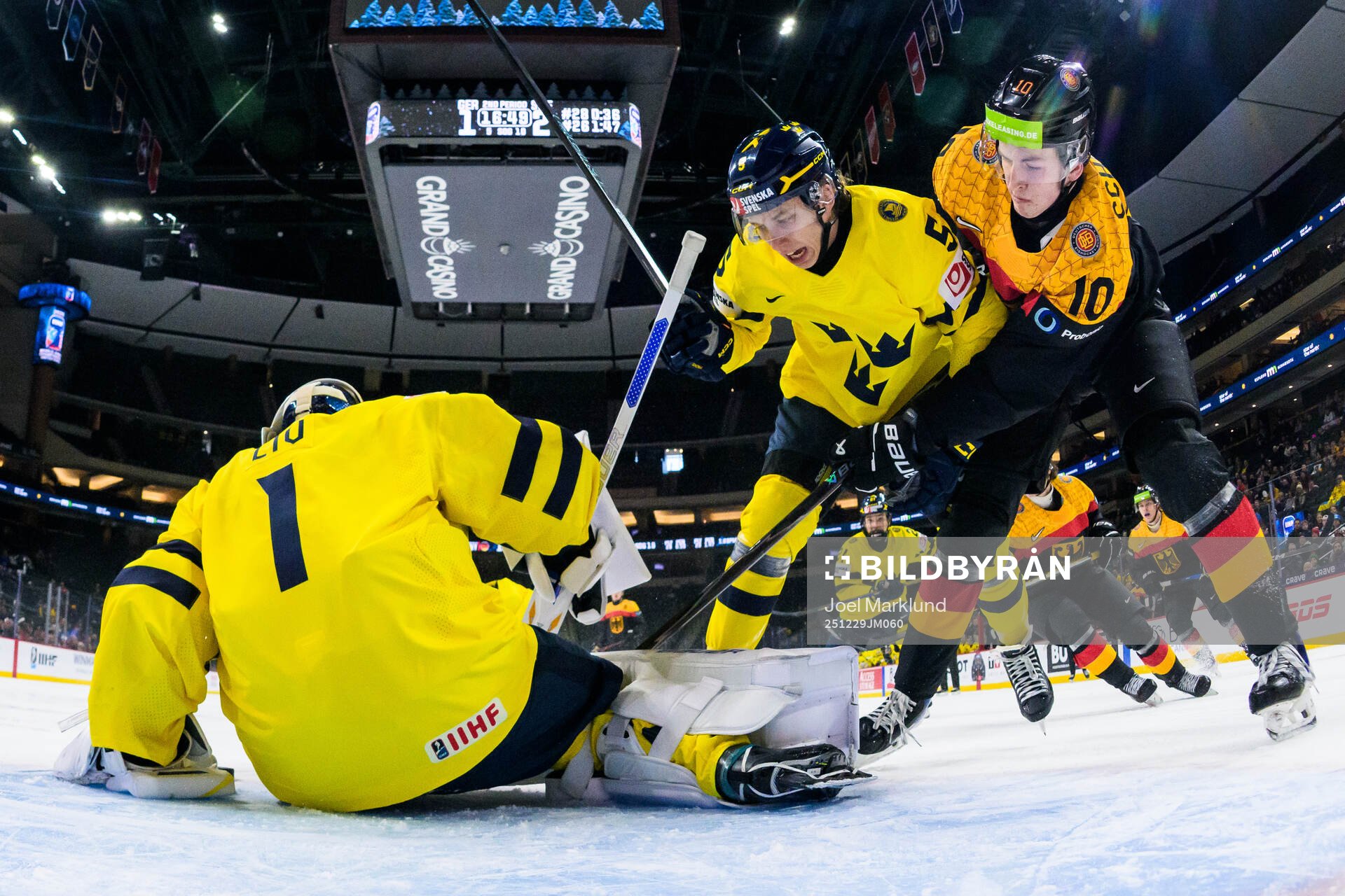 Goaltender Herman Liv and Sascha Boumedienne of Sweden are