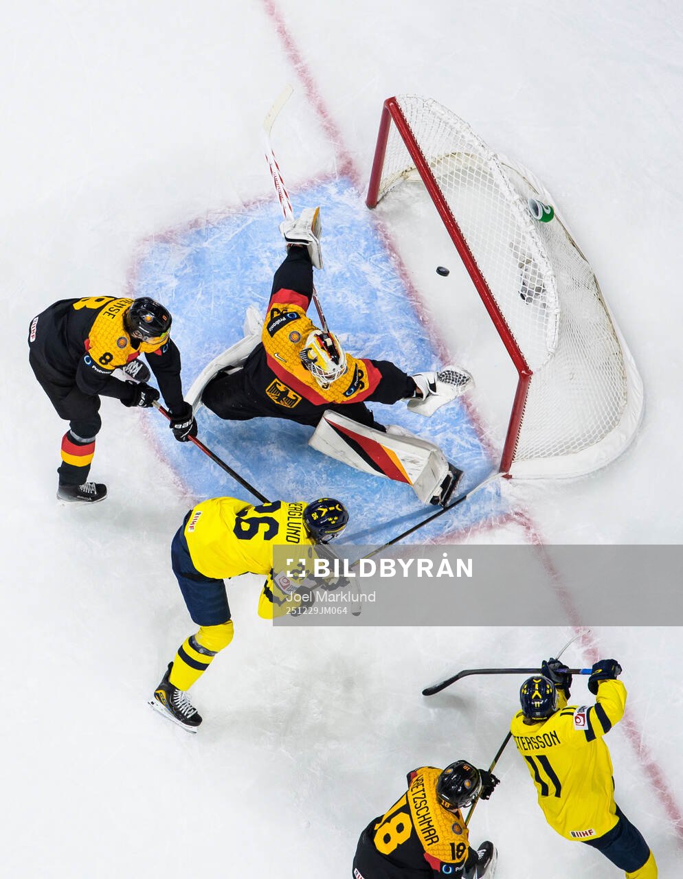 Jack Berglund of Sweden scores the 1-8 goal behind