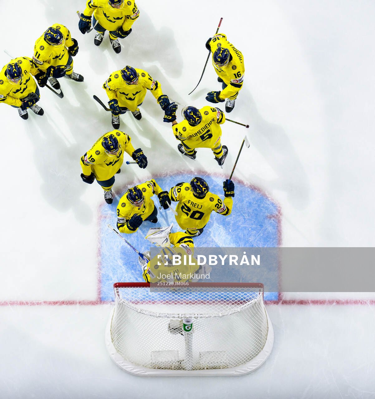 Players of Sweden celebrate with goaltender Herman Liv