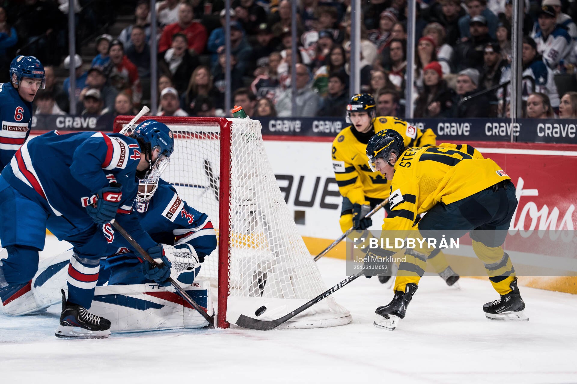 Asher Bernett and goaltender Nicholas Kempf of USA and Ivar