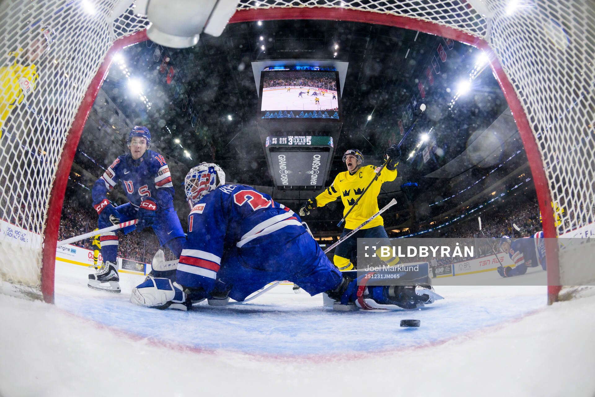 Jack Berglund of Sweden celebrates when Ivar Stenberg of