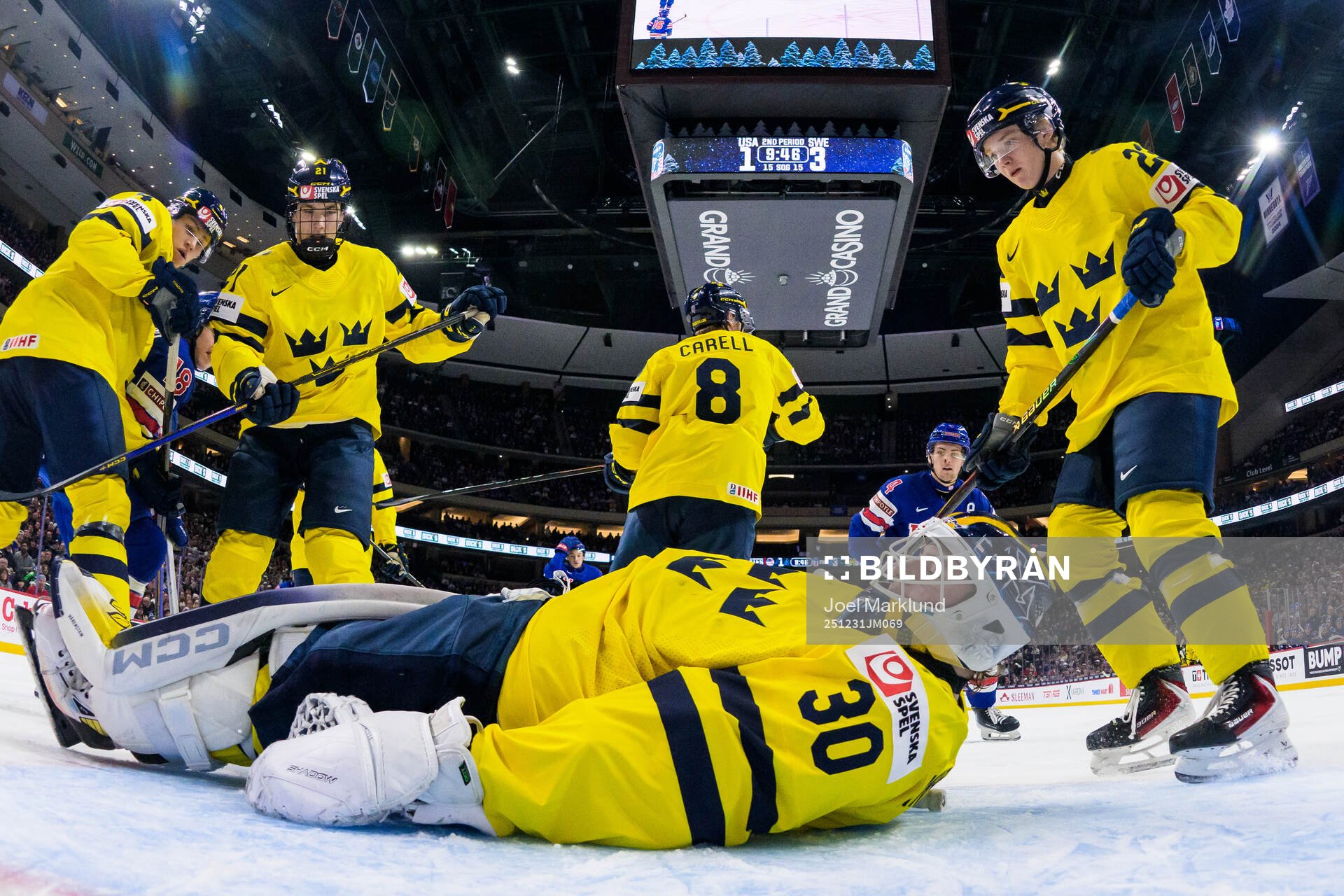 Goaltender Love Härenstam of Sweden covers the puck