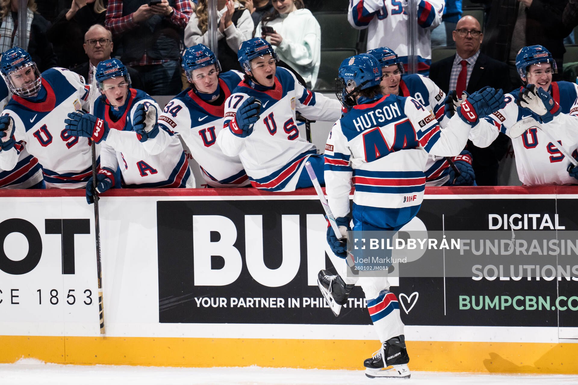 Cole Hutson of USA celebrates